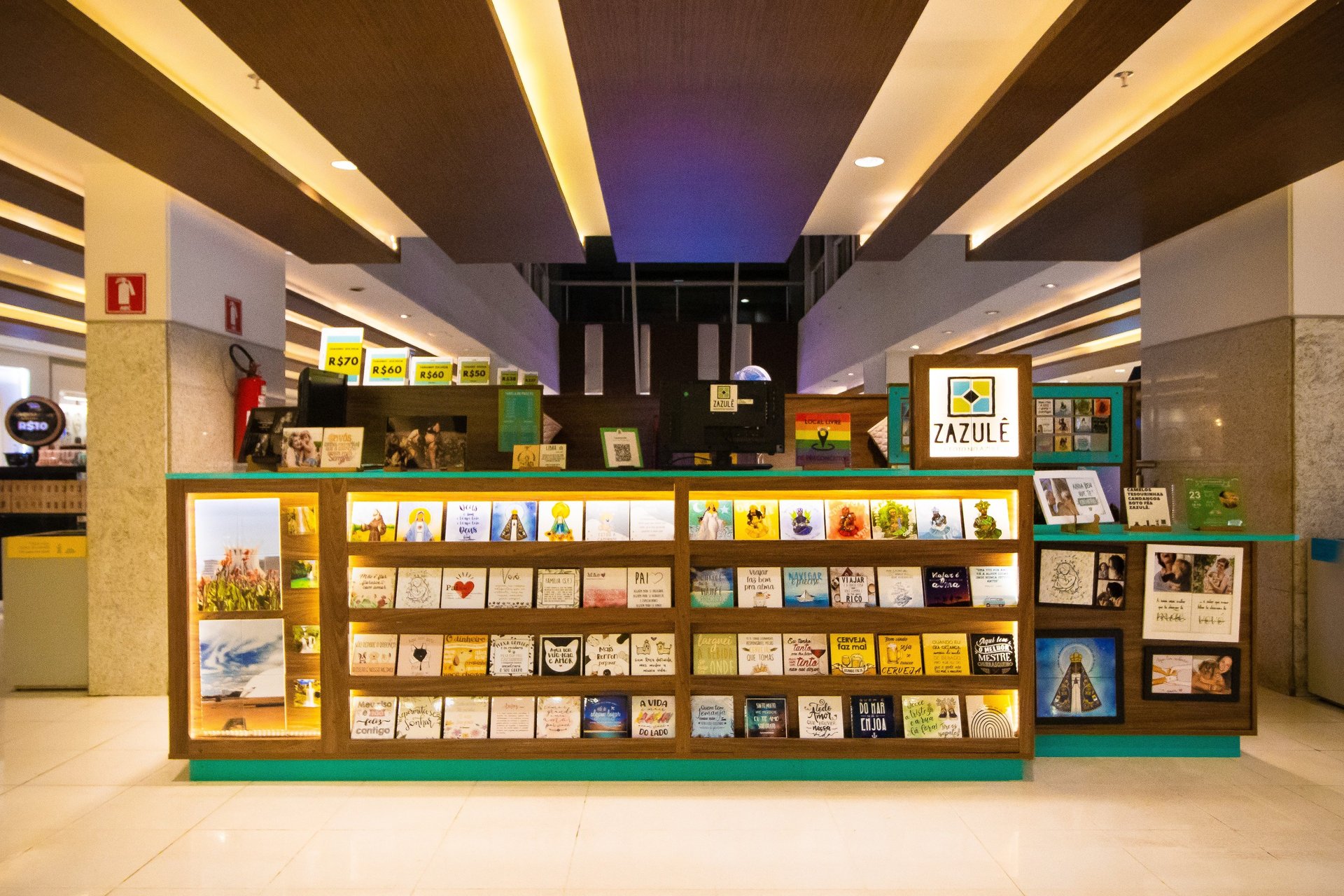 a couple of people that are standing in front of a counter