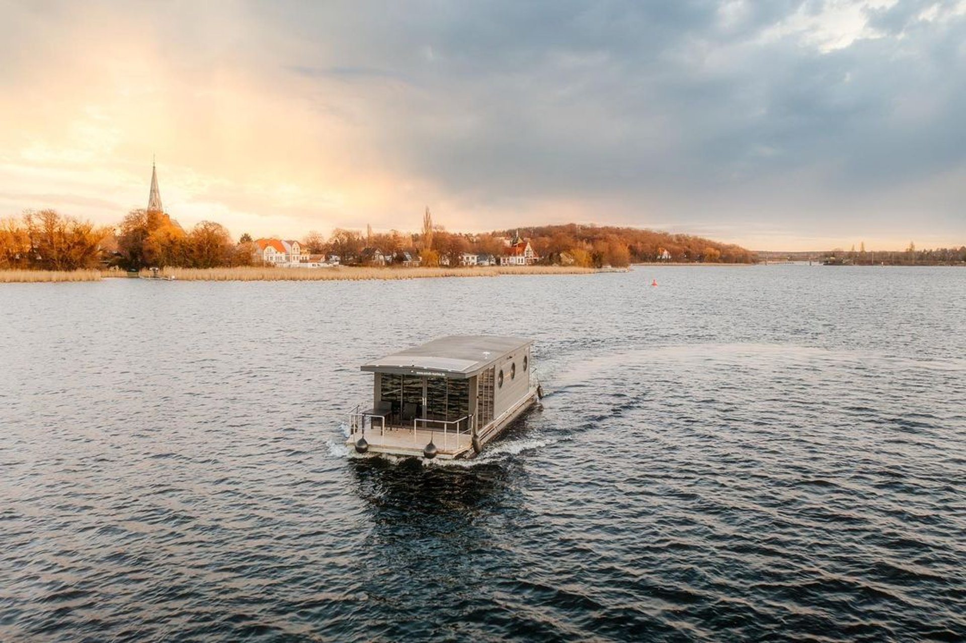 a boat floating on top of a large body of water