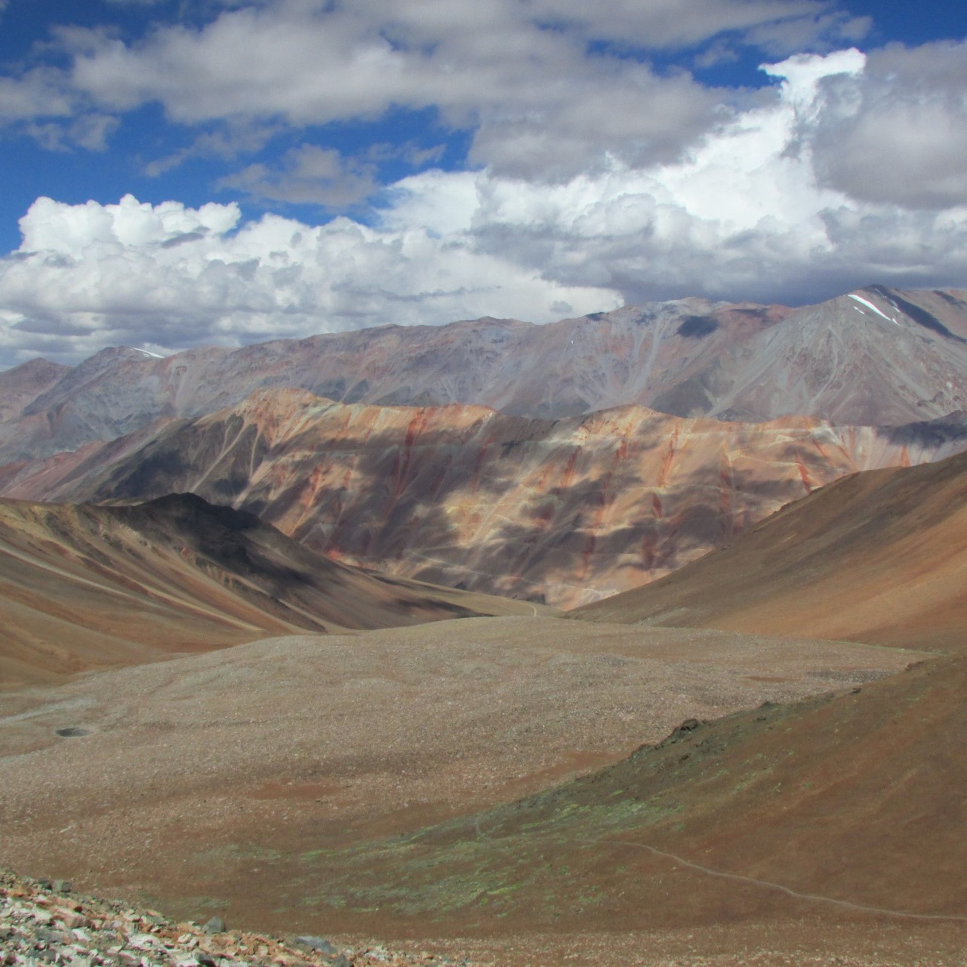 black and brown leather padded tub sofa