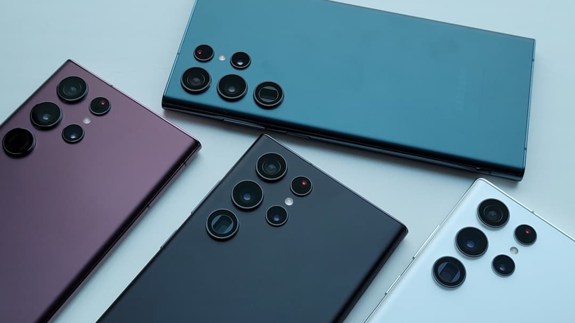 Four Samsung smartphones with BackBuzz mobile covers