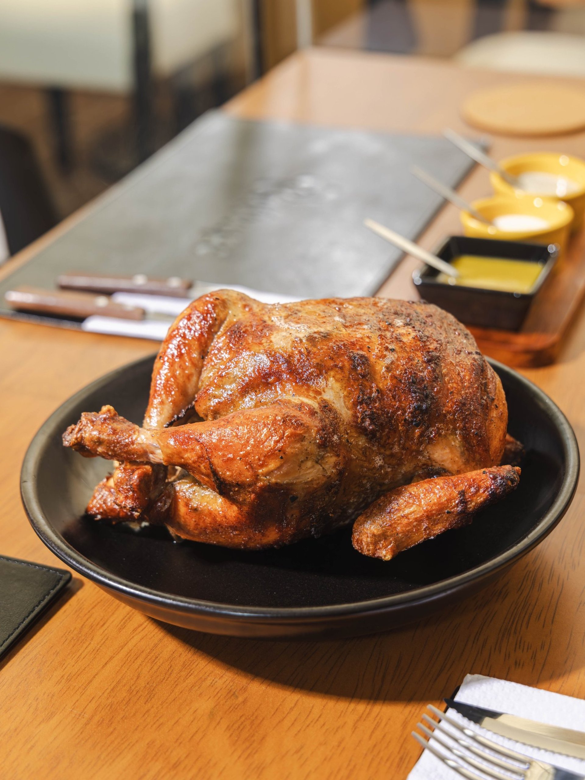 woman wearing yellow long-sleeved dress under white clouds and blue sky during daytime