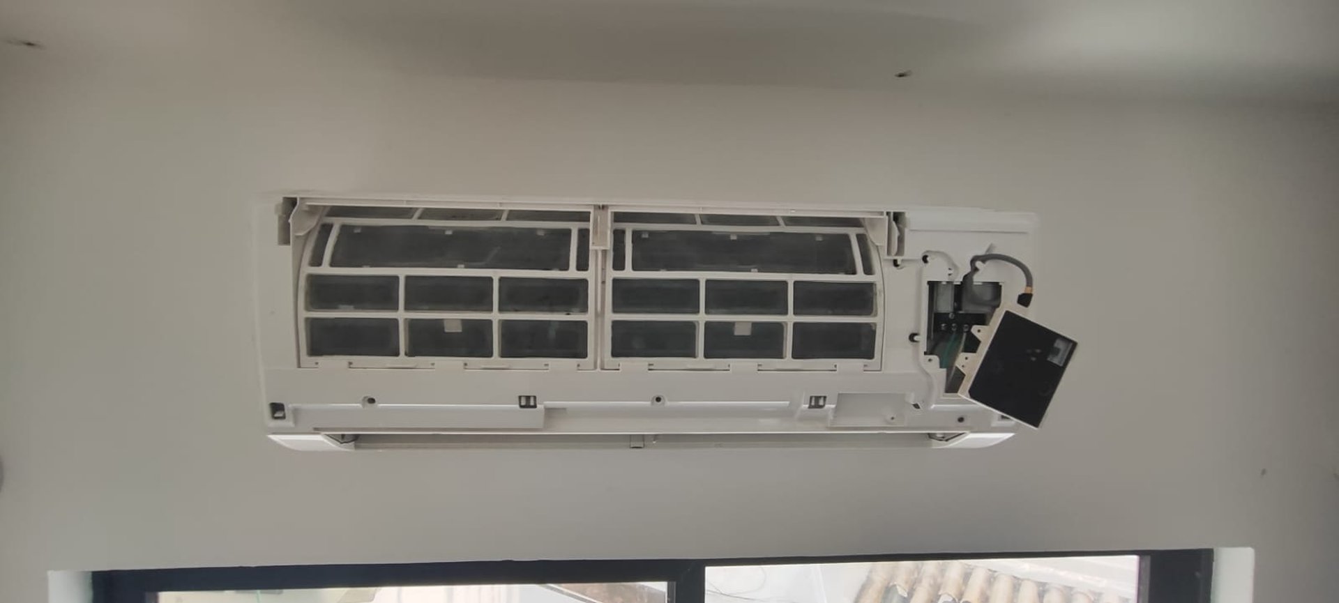 a computer keyboard, light bulbs, and other electronics on a purple and yellow background