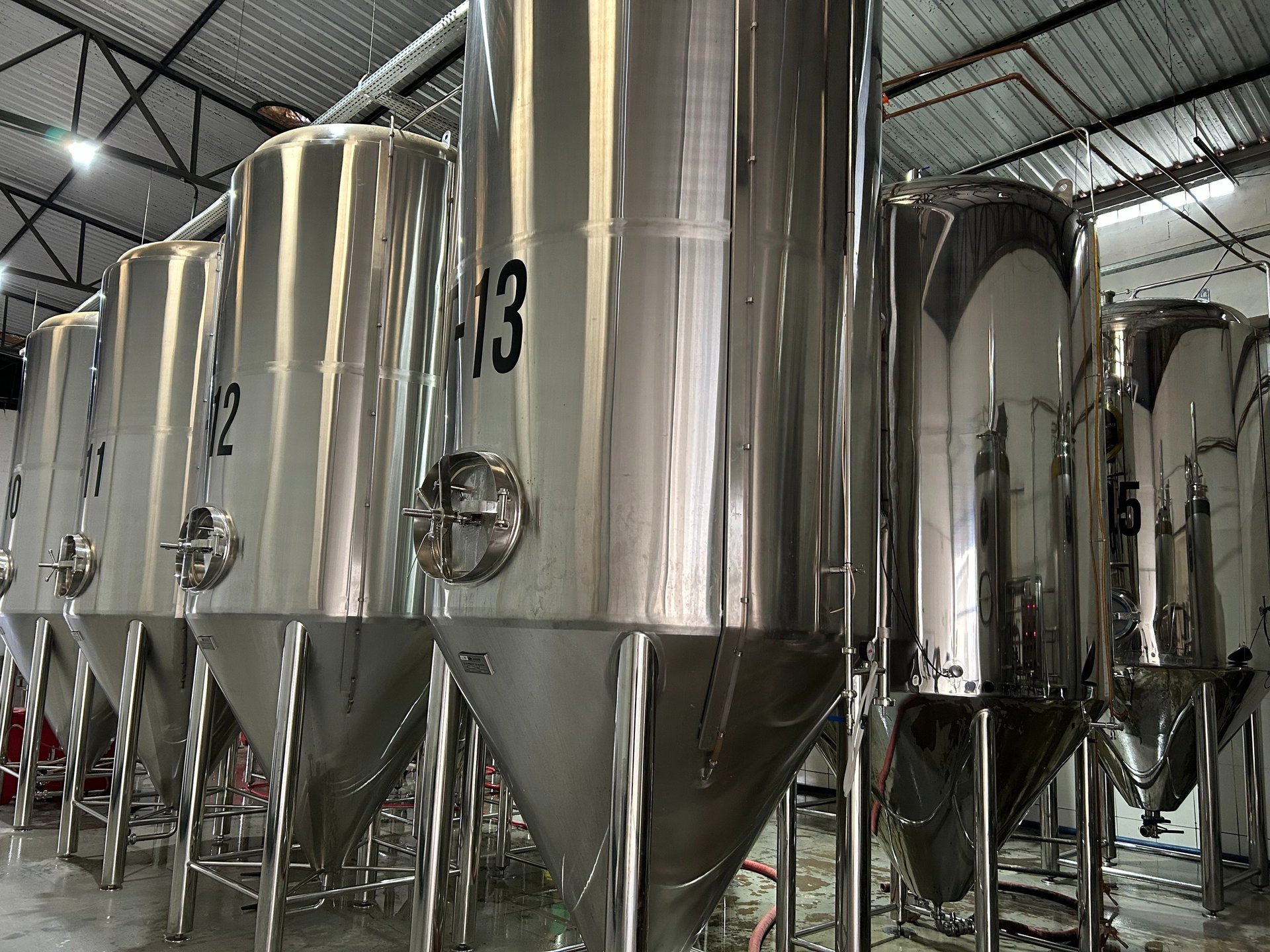 an abstract photo of a curved building with a blue sky in the background