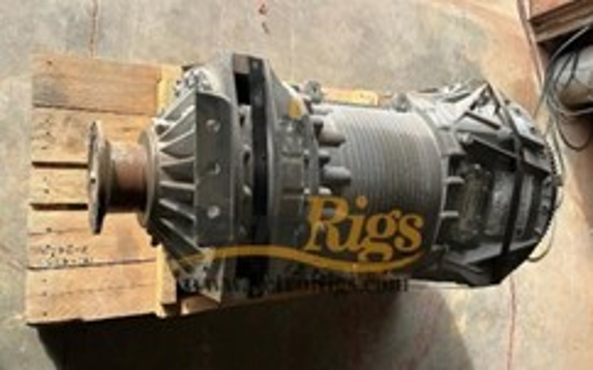 black and orange metal machine on green grass field during daytime