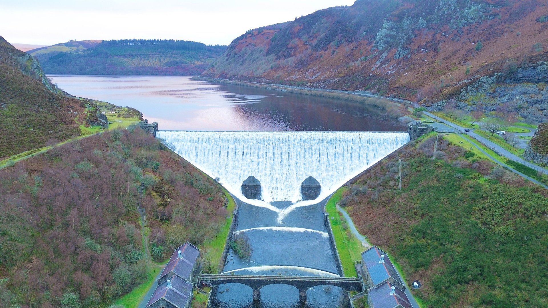 black and brown leather padded tub sofa