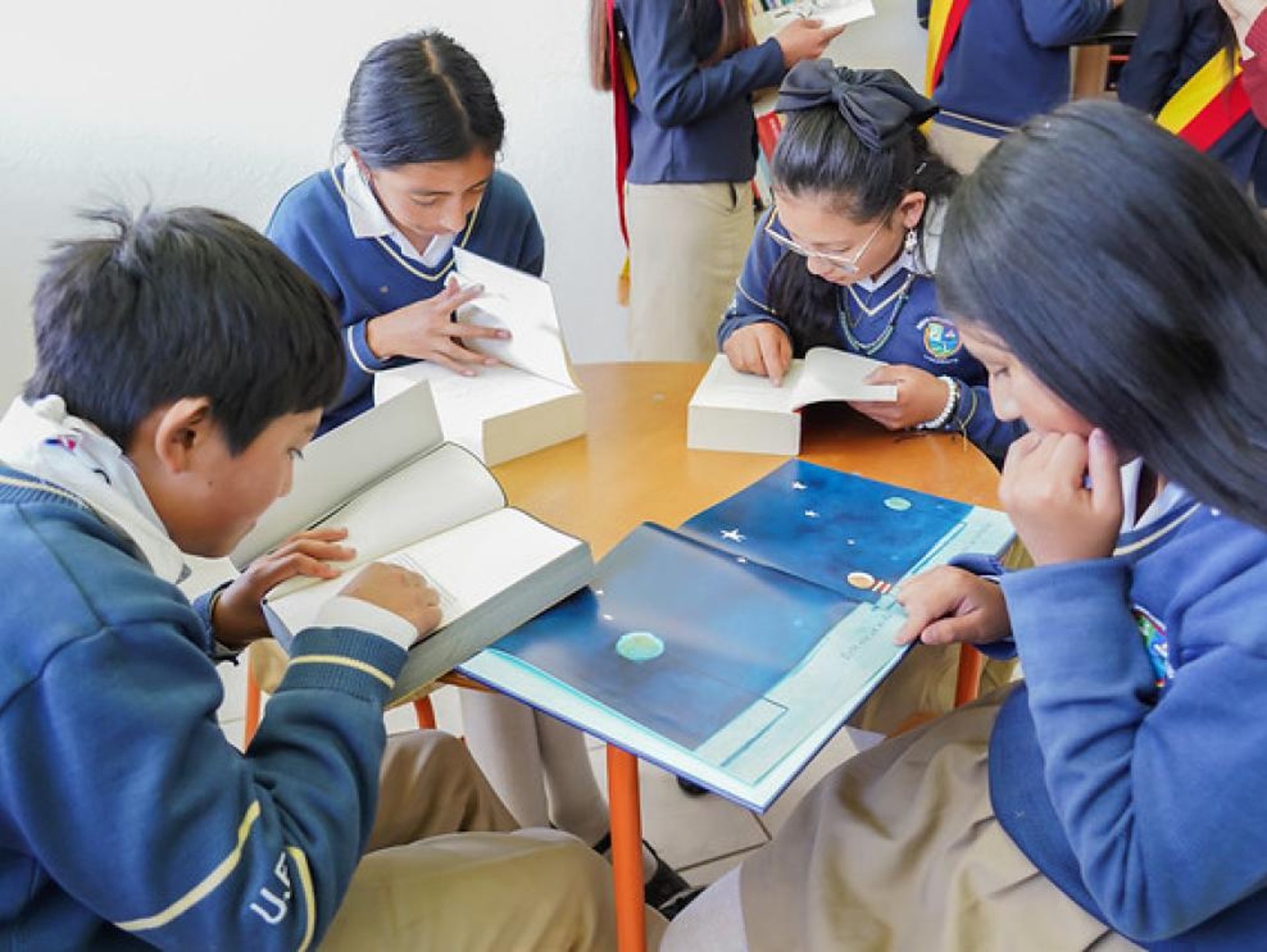 woman wearing yellow long-sleeved dress under white clouds and blue sky during daytime