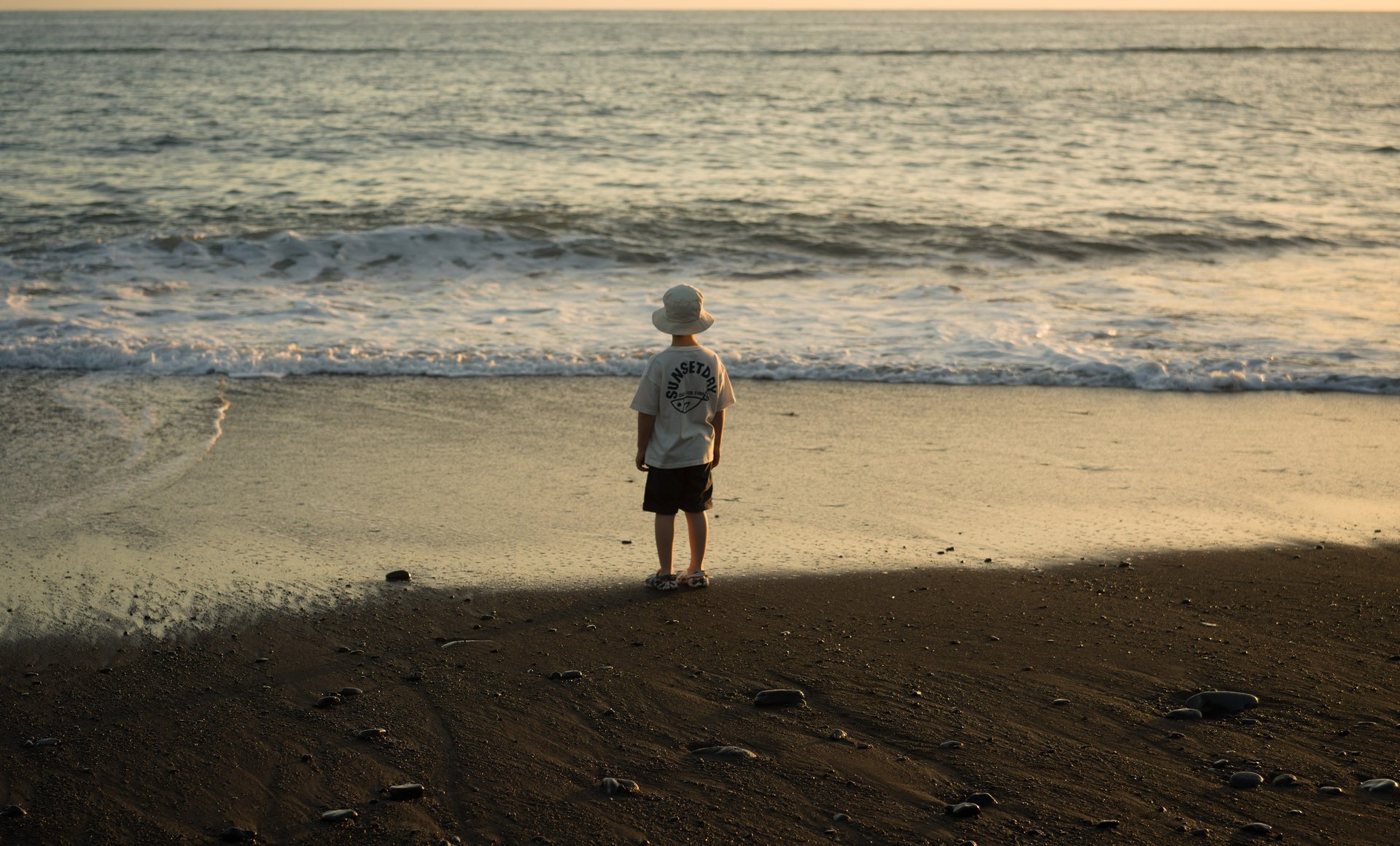 Boy on the beach. Madeira - praia formosa.