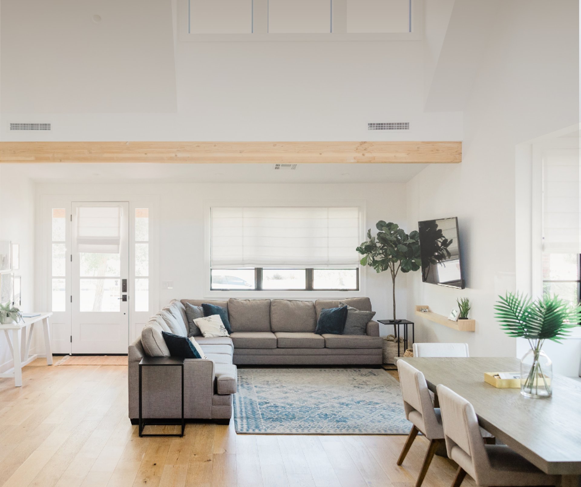 person wearing grey knit sweater