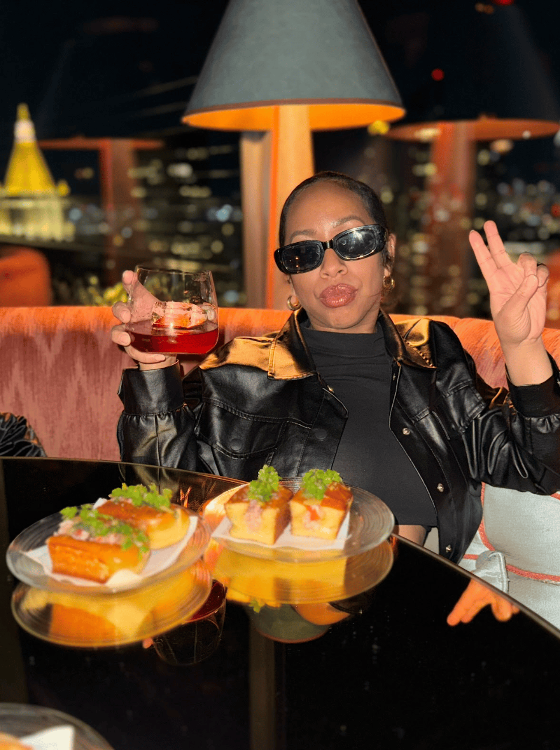 an abstract photo of a curved building with a blue sky in the background