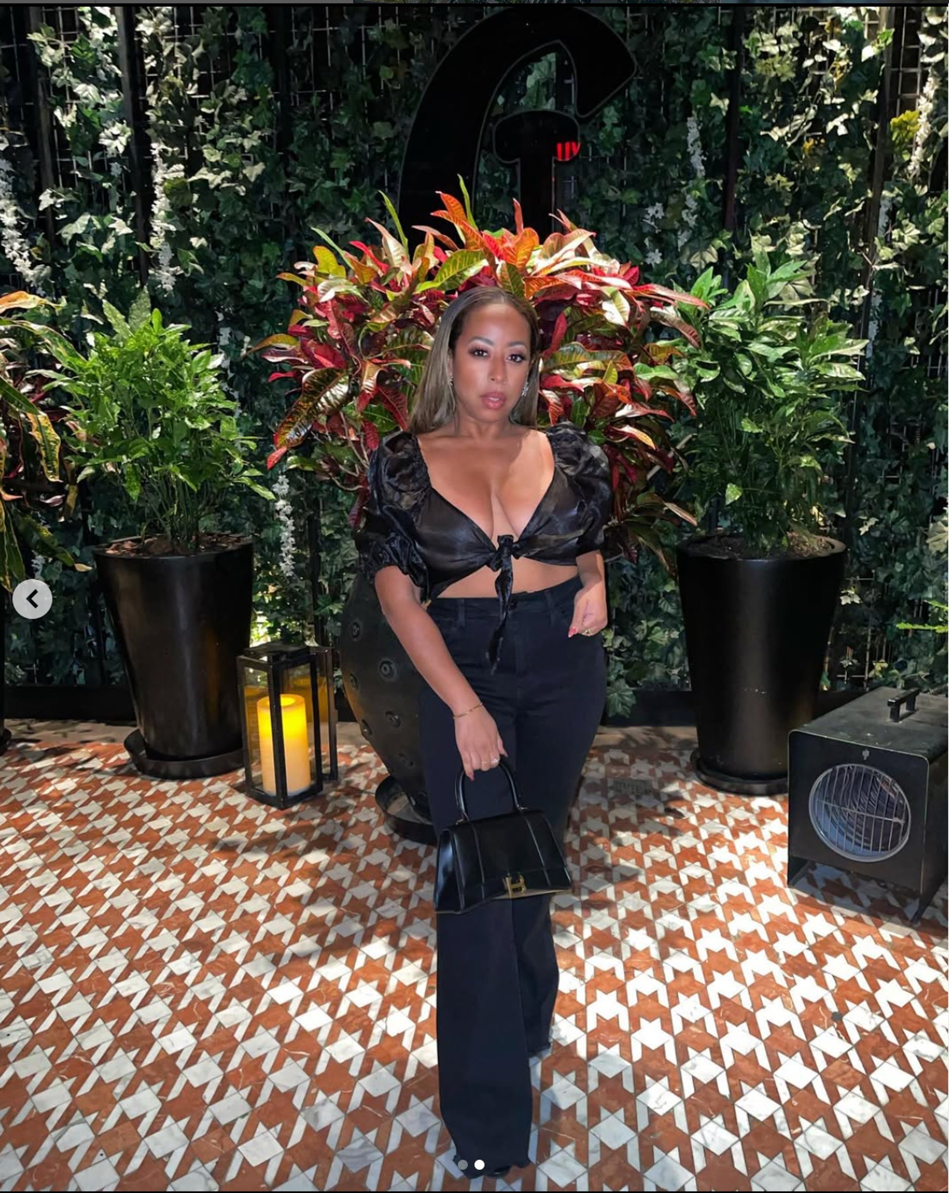 an abstract photo of a curved building with a blue sky in the background