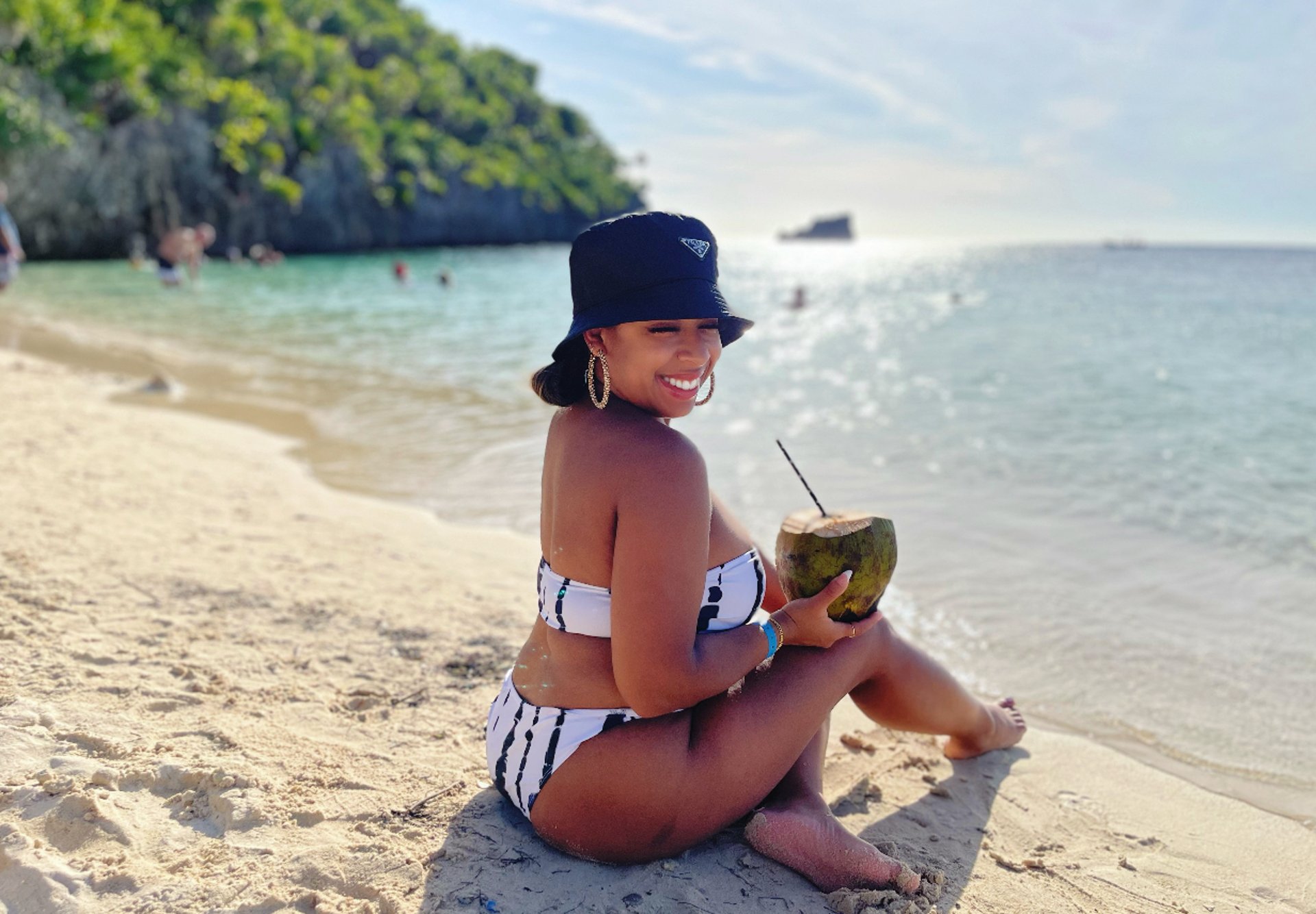 an abstract photo of a curved building with a blue sky in the background