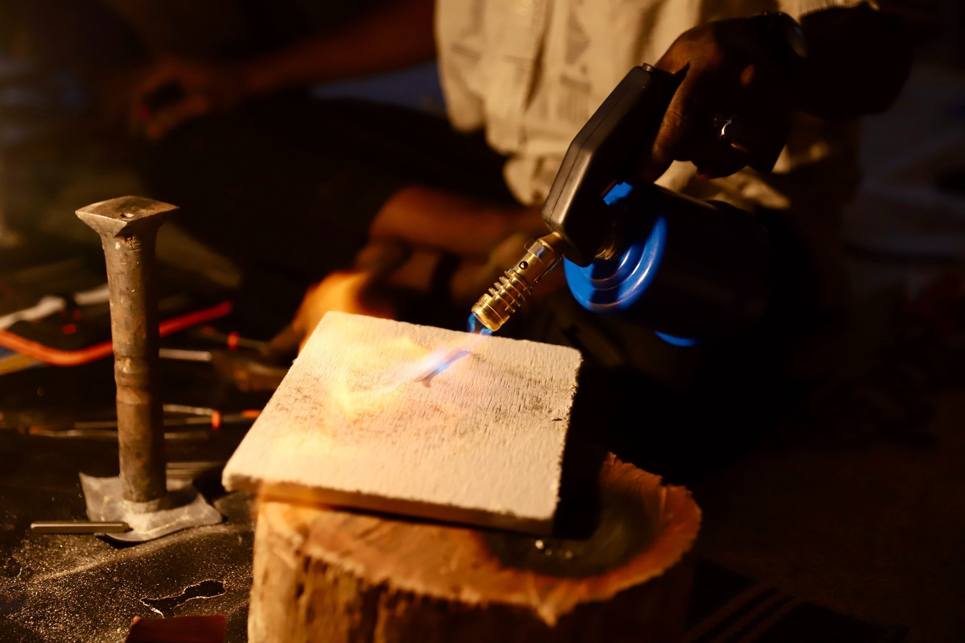A woman walking down a street in a village