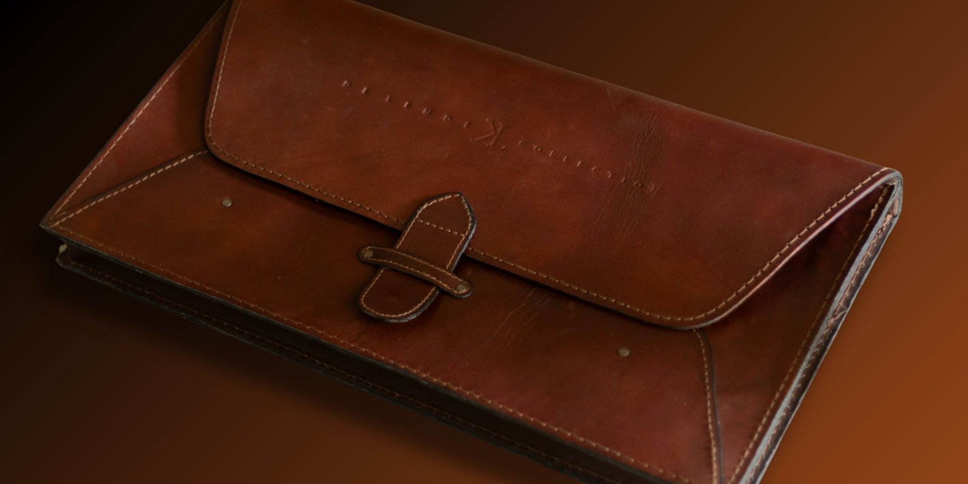 Handcrafted leather case for the Moments of Grace panoramic coffee table book by landscape photographer Koos van der Lende.