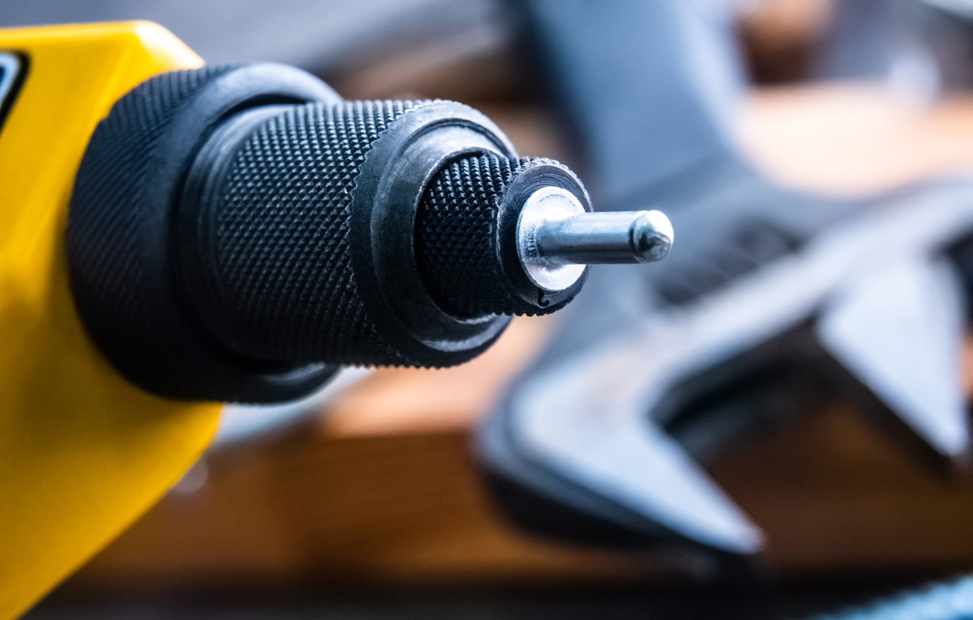 an abstract photo of a curved building with a blue sky in the background