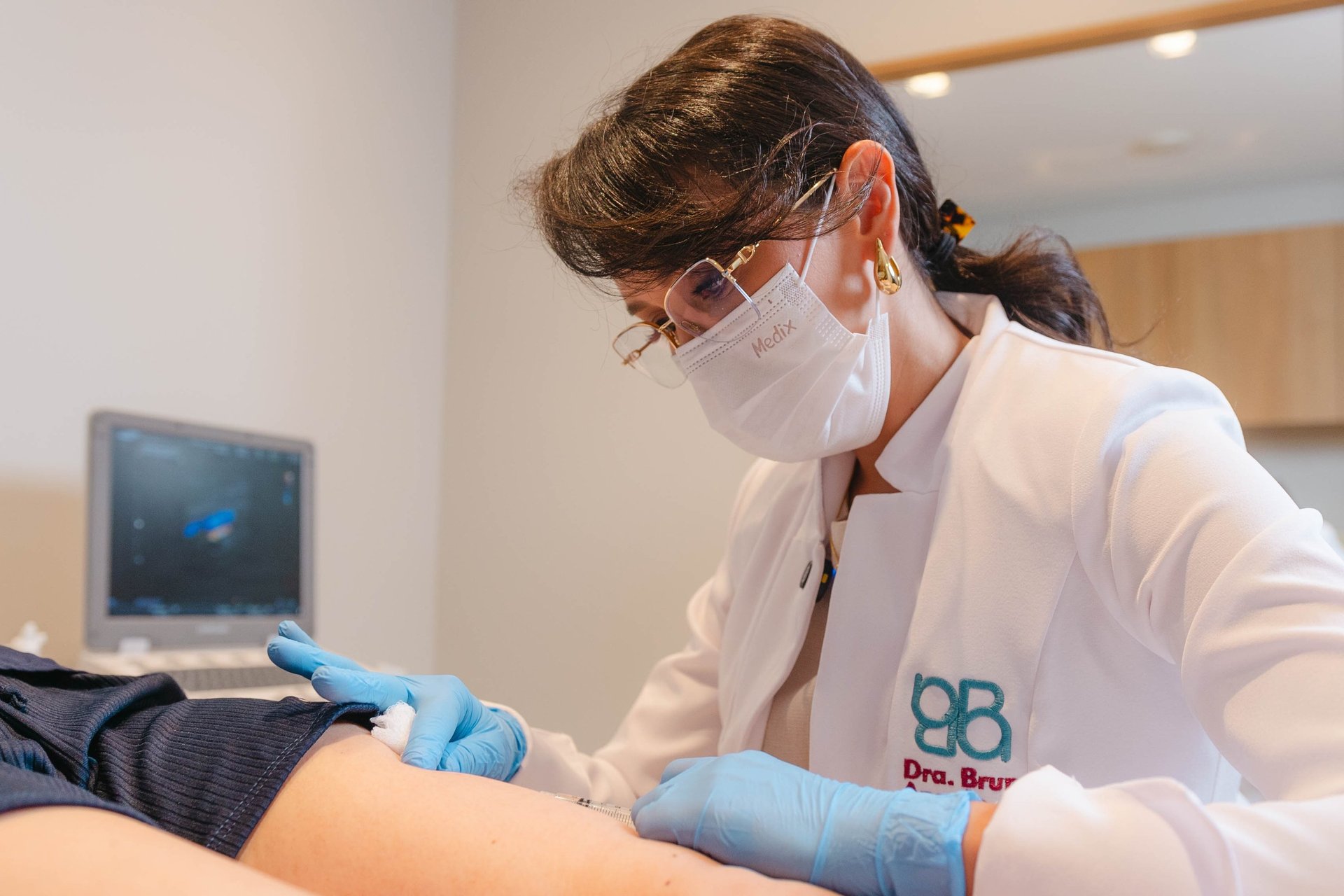 black and brown leather padded tub sofa