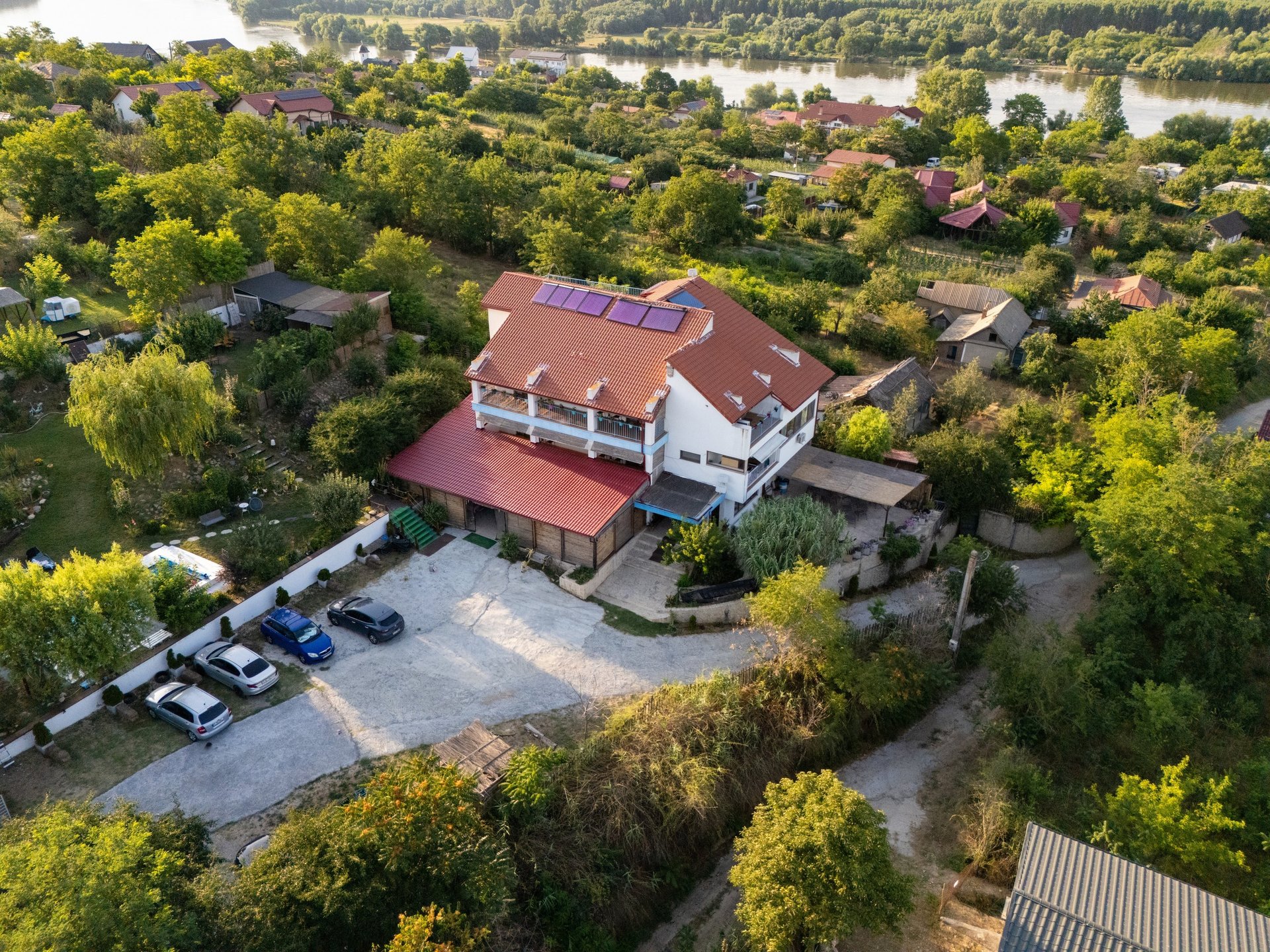 an abstract photo of a curved building with a blue sky in the background