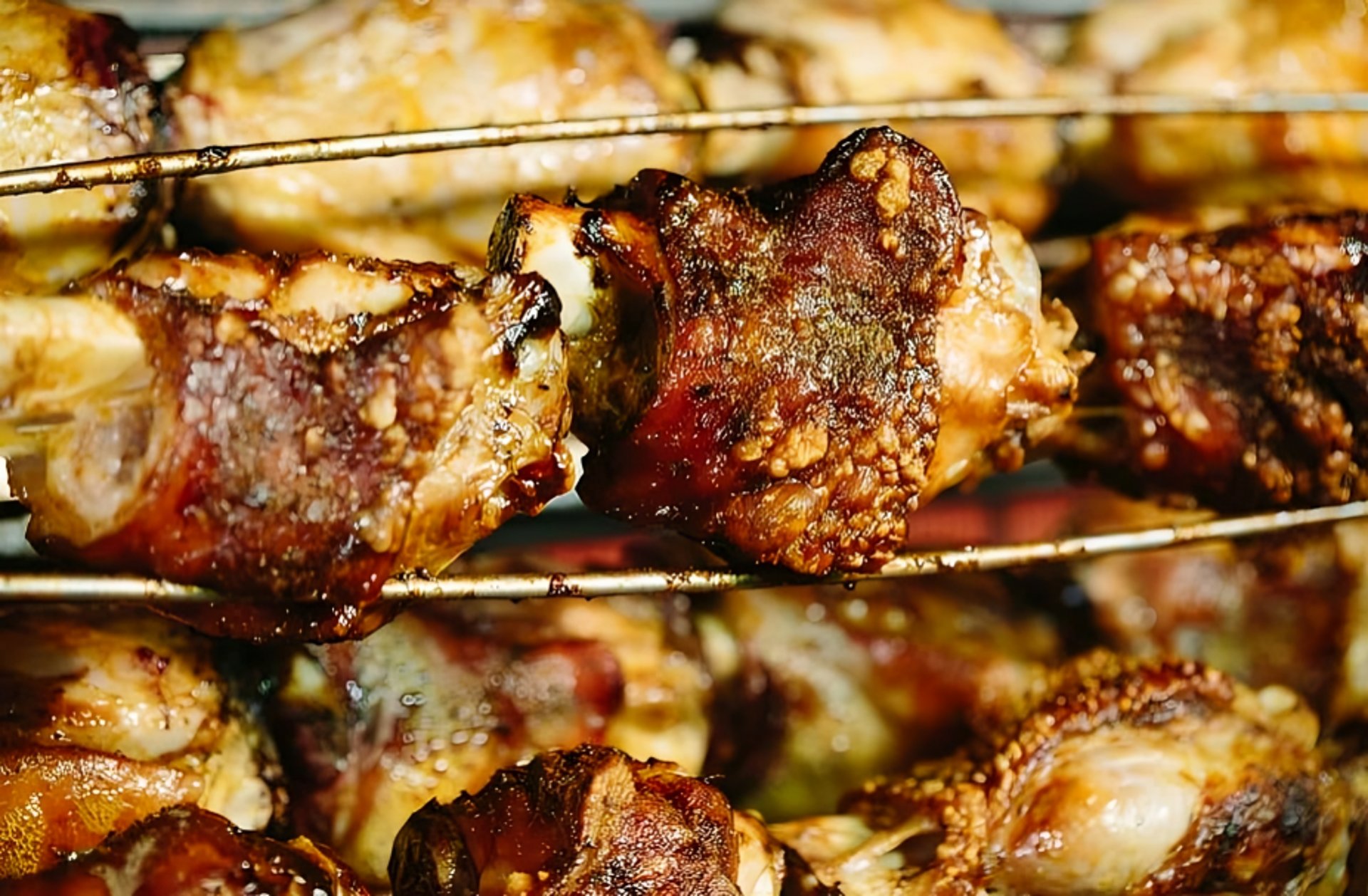 roasted ribs with sliced tomatoes and potatoes