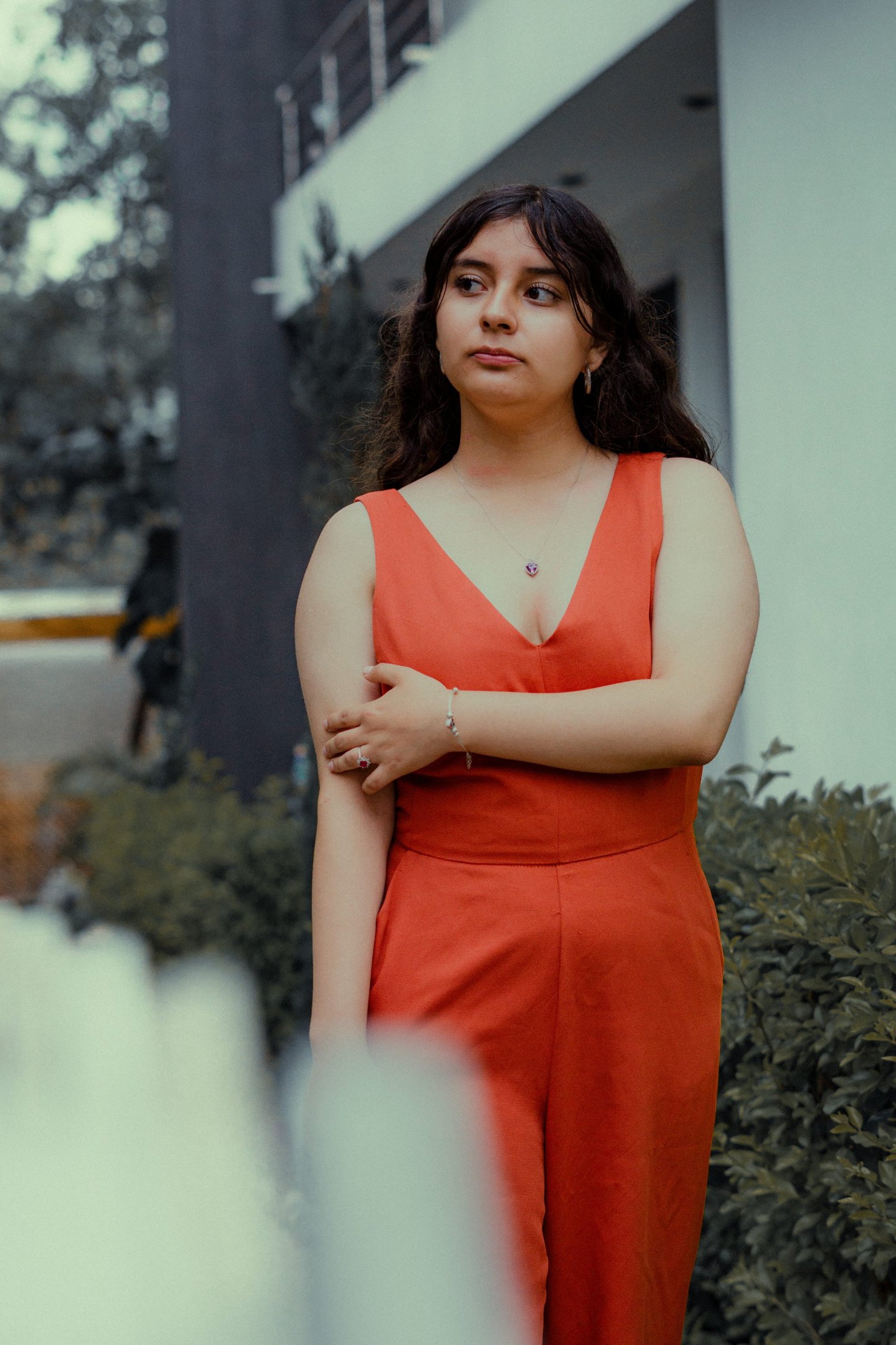 woman wearing yellow long-sleeved dress under white clouds and blue sky during daytime