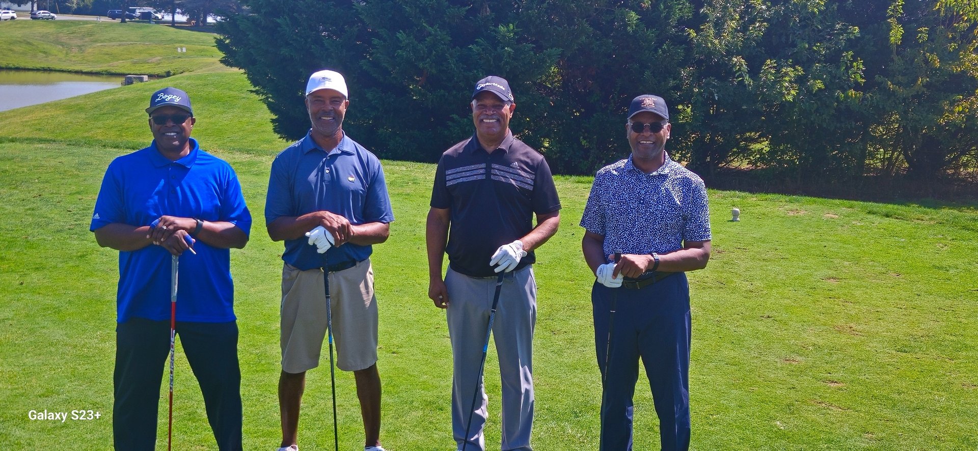 an abstract photo of a curved building with a blue sky in the background