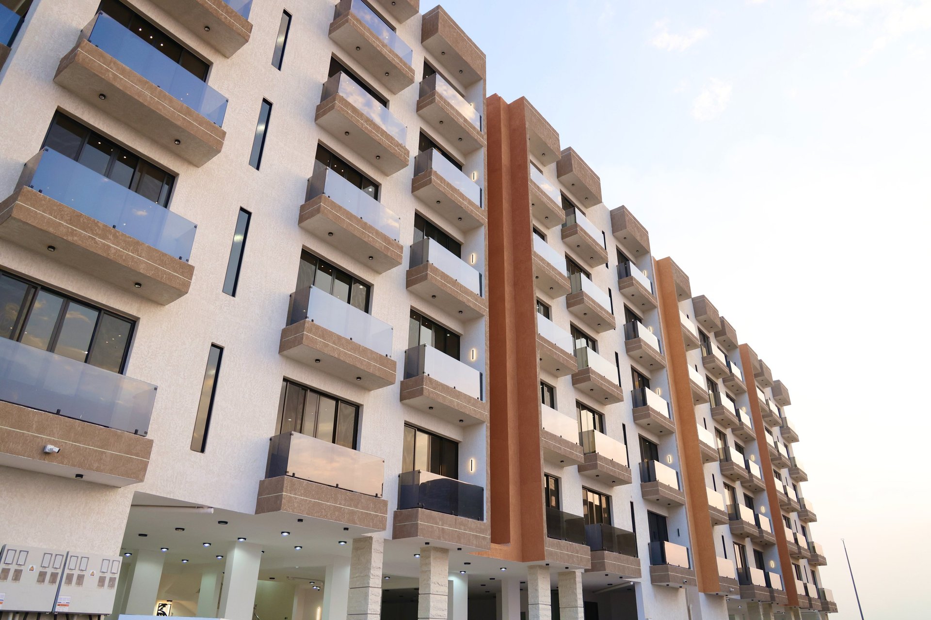 black and brown leather padded tub sofa
