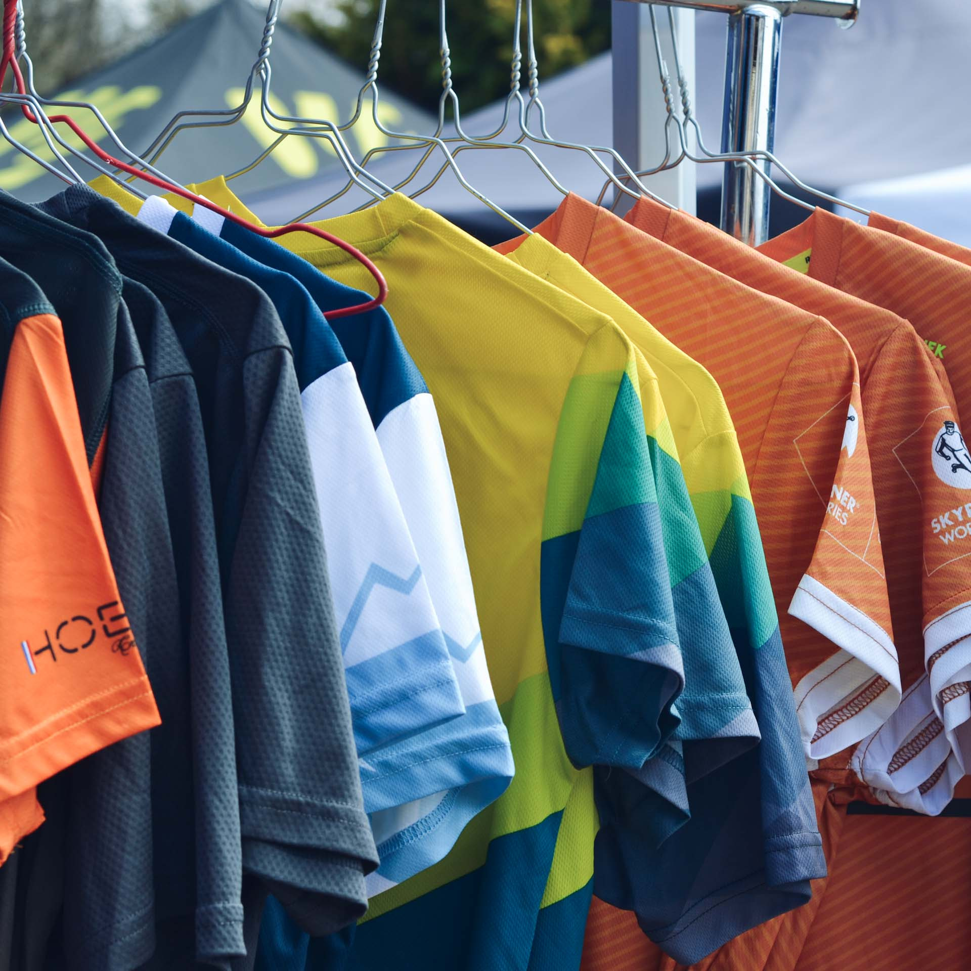 an abstract photo of a curved building with a blue sky in the background