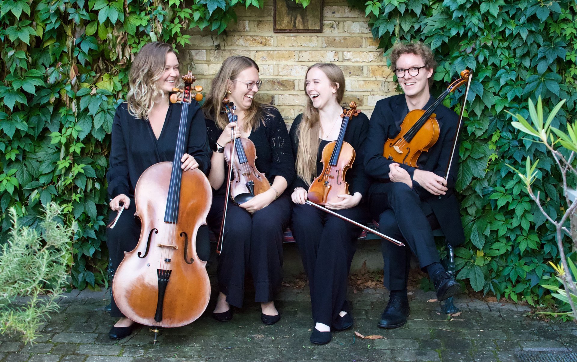 an abstract photo of a curved building with a blue sky in the background