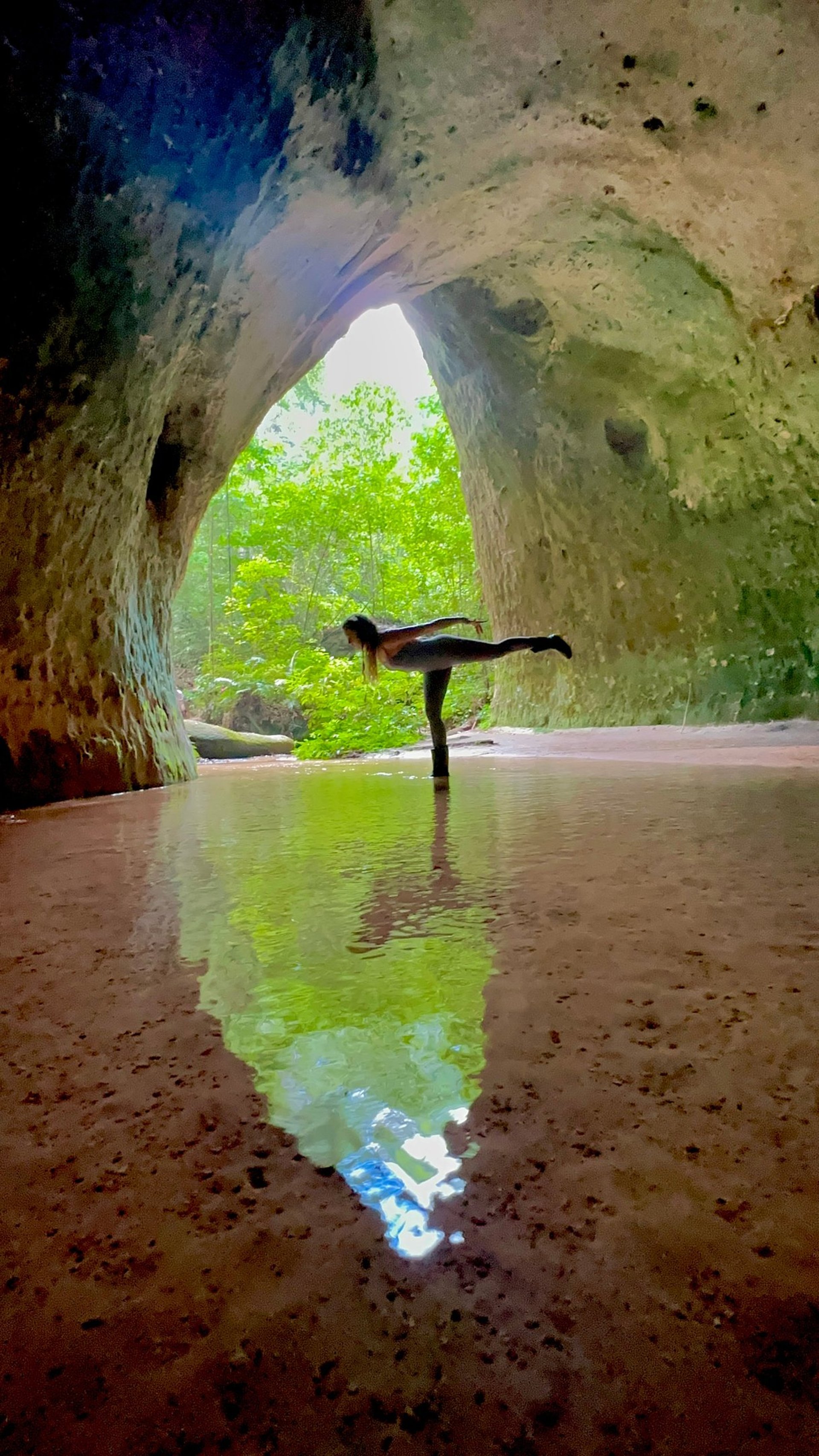an abstract photo of a curved building with a blue sky in the background
