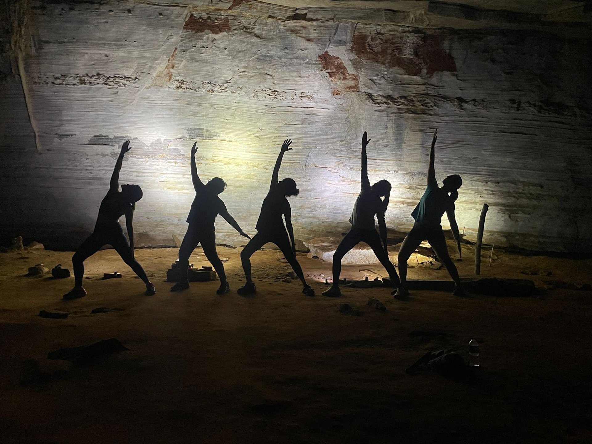 an abstract photo of a curved building with a blue sky in the background