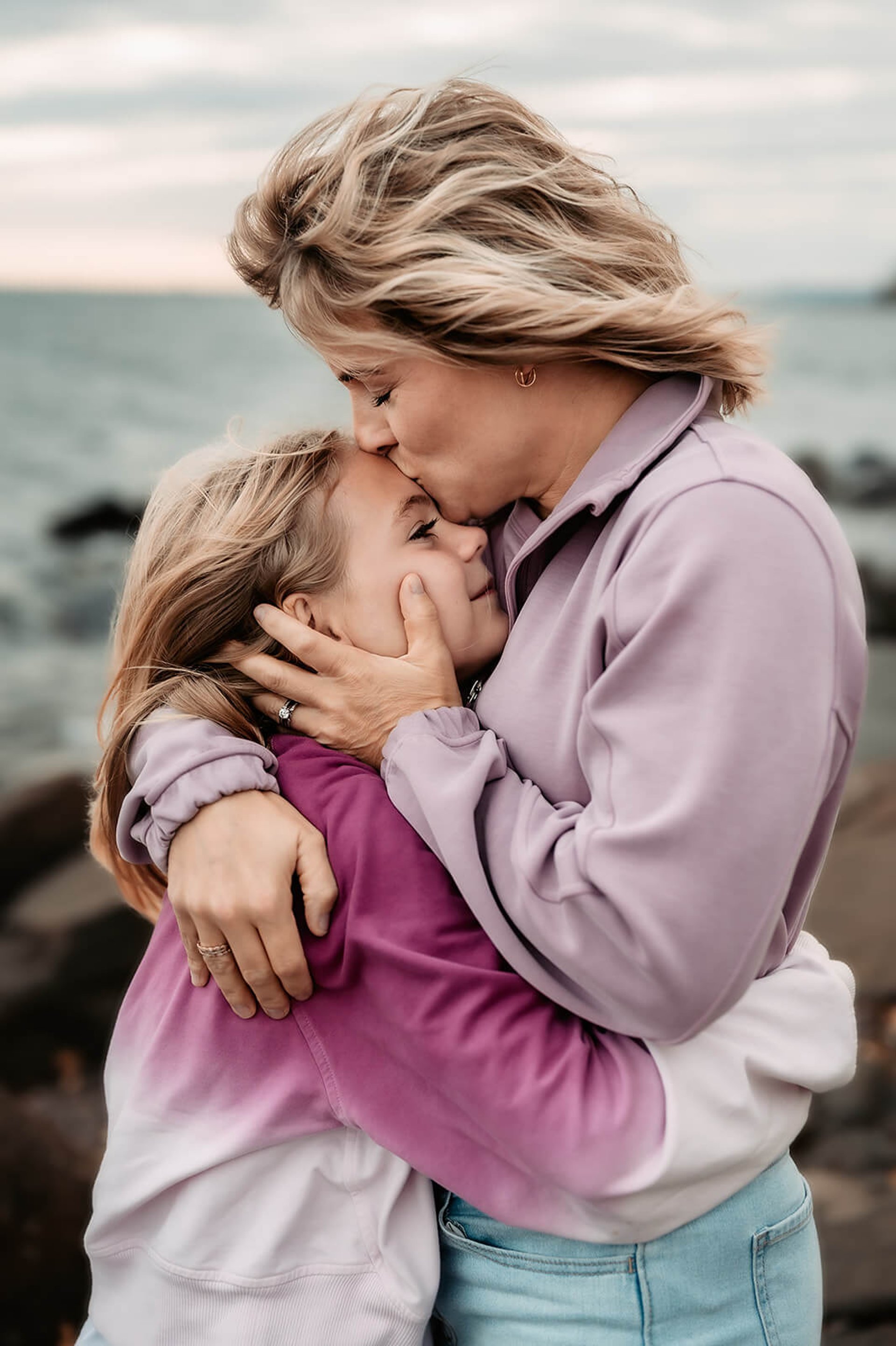 an abstract photo of a curved building with a blue sky in the background