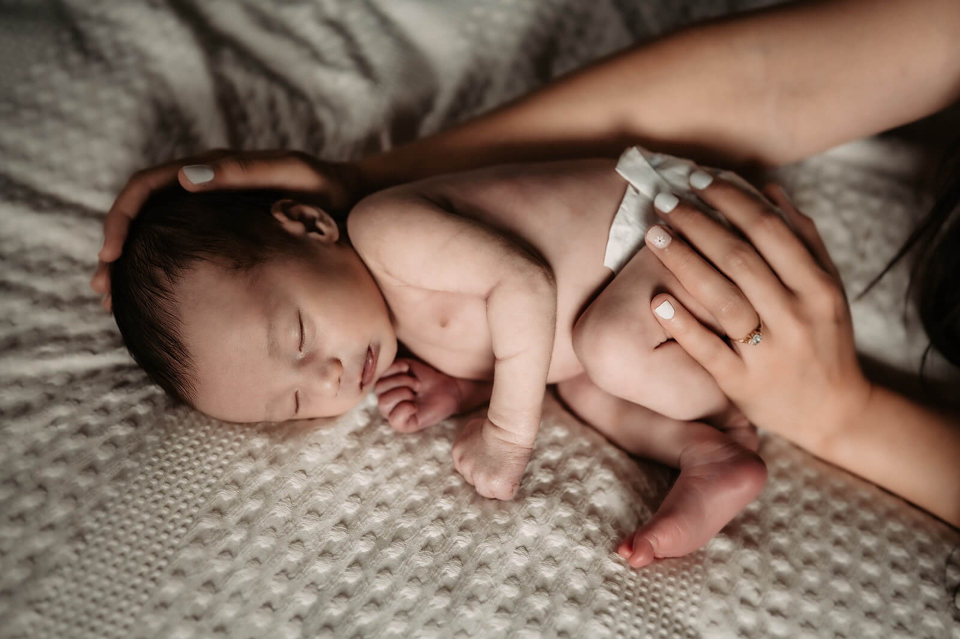 an abstract photo of a curved building with a blue sky in the background