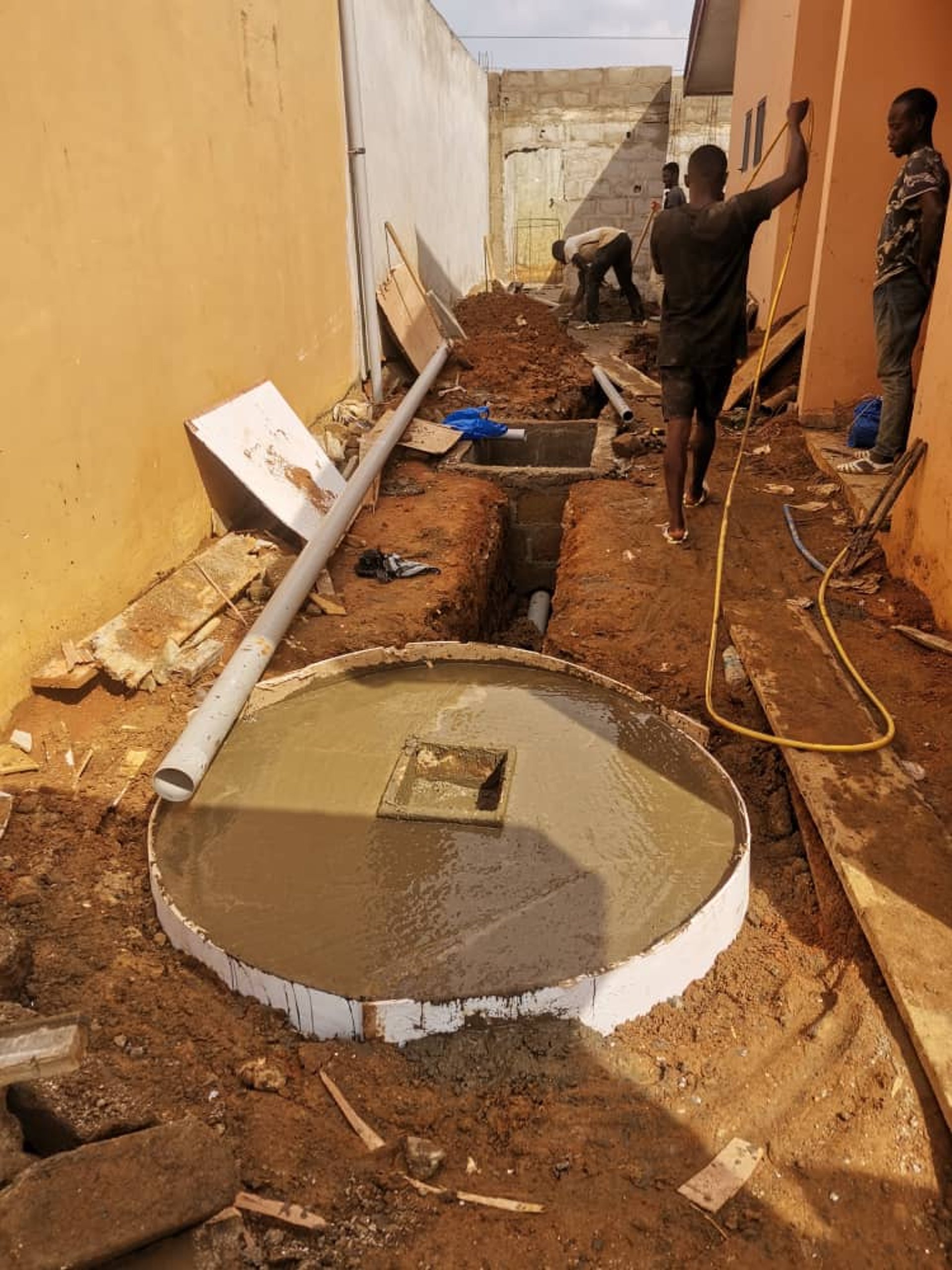 woman wearing yellow long-sleeved dress under white clouds and blue sky during daytime