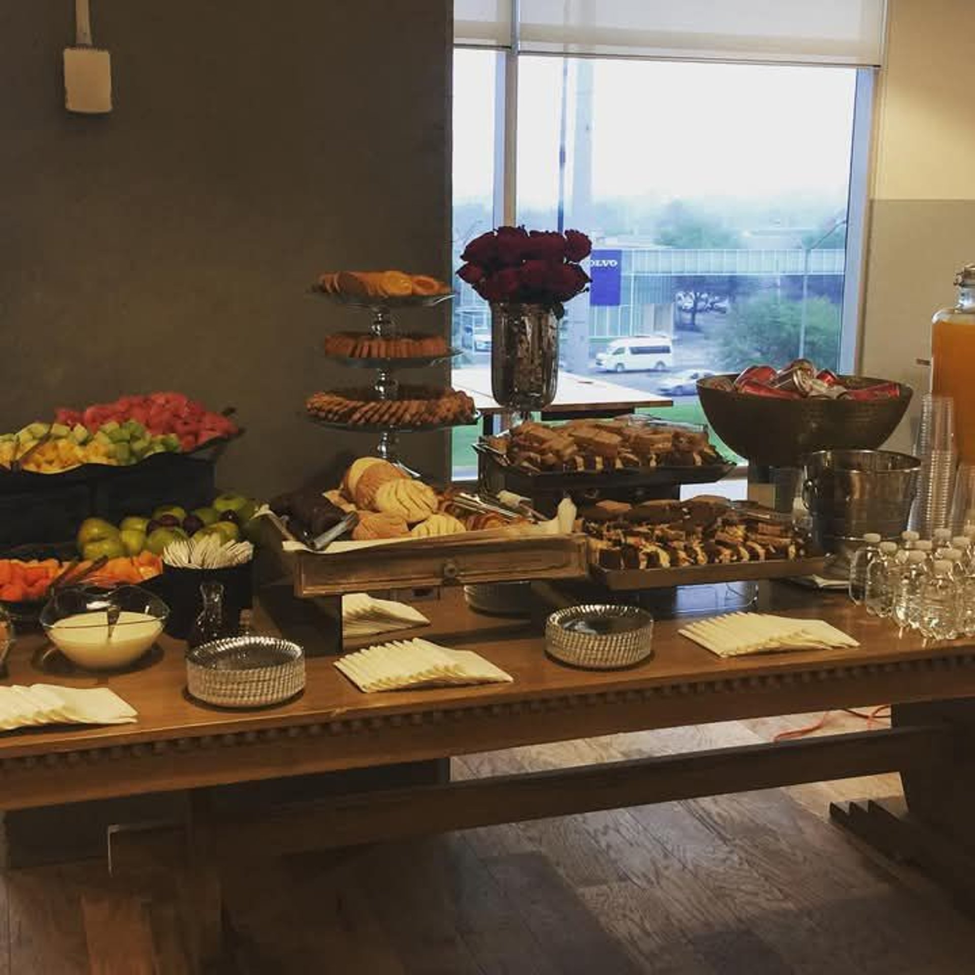 an abstract photo of a curved building with a blue sky in the background