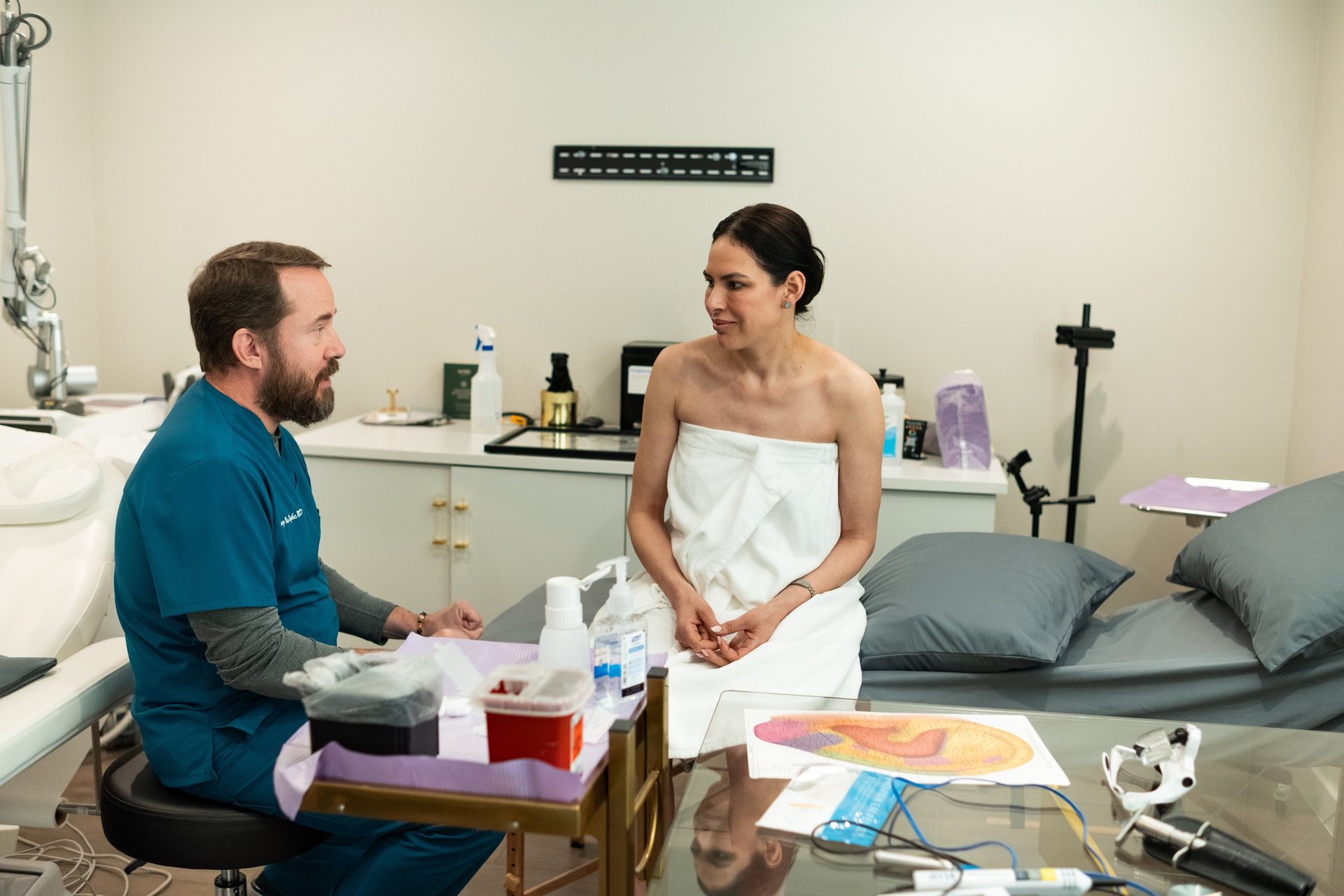 an abstract photo of a curved building with a blue sky in the background