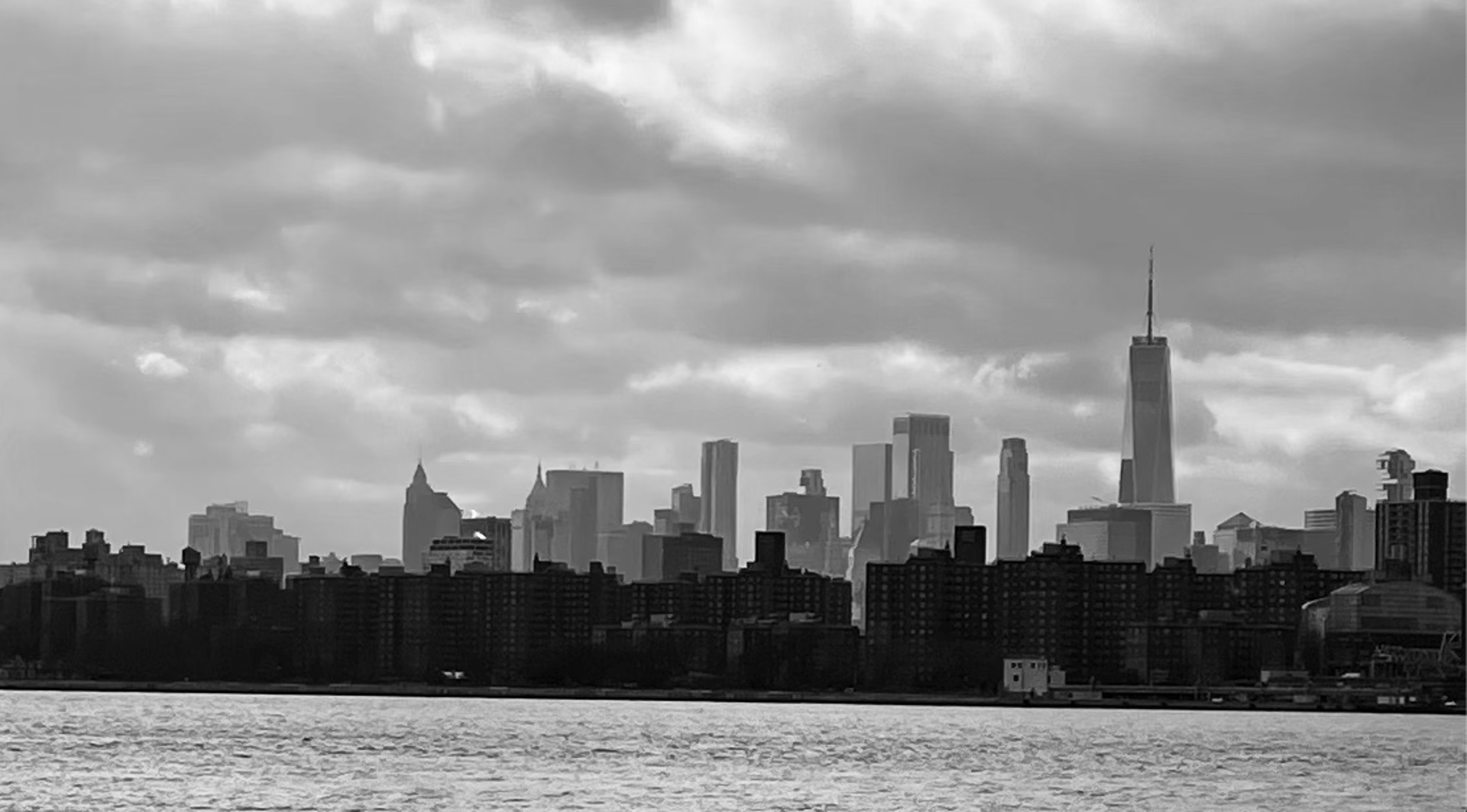 a view of a city at night from the top of a building