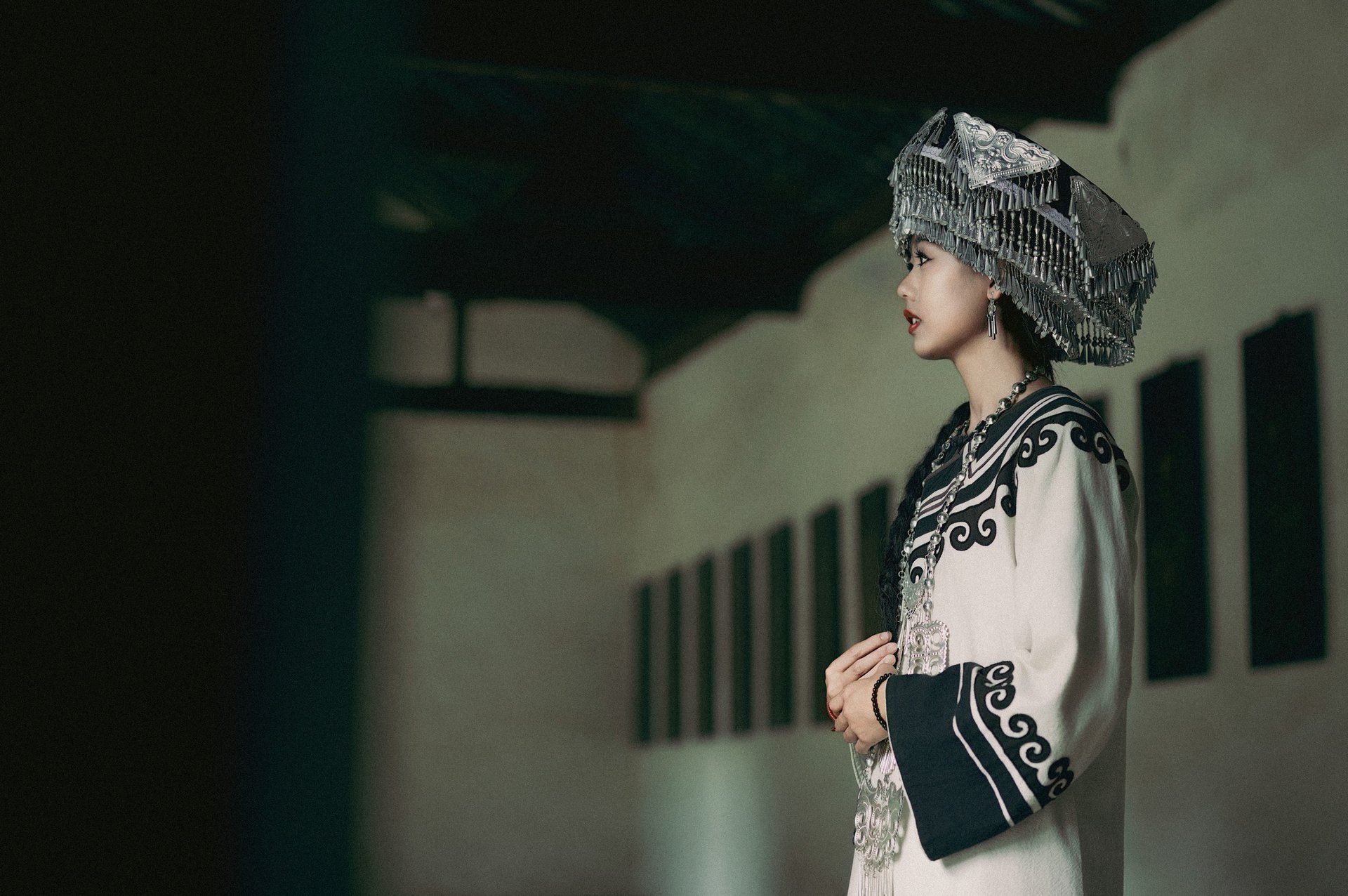 person wearing grey knit sweater