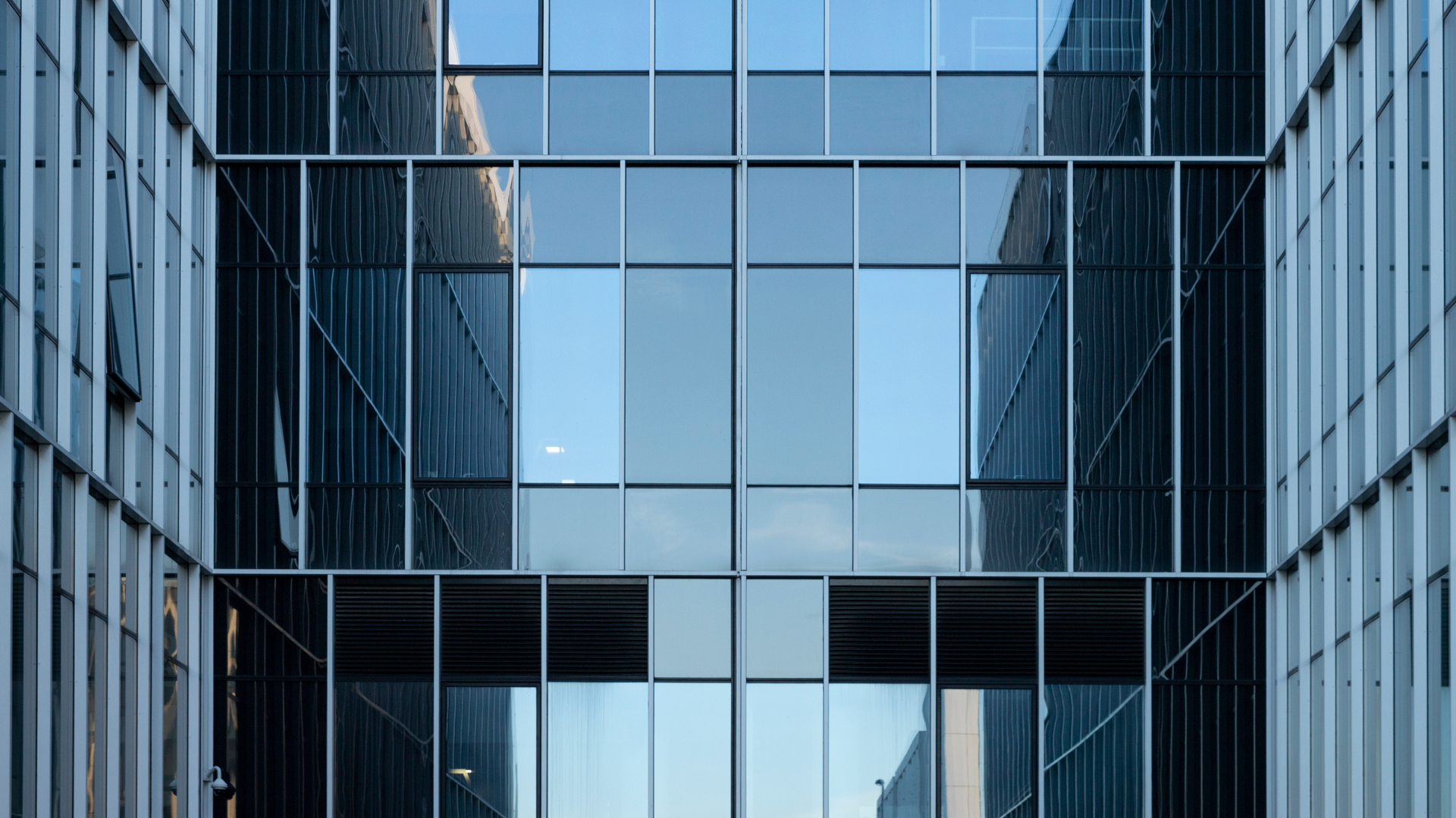 black and brown leather padded tub sofa
