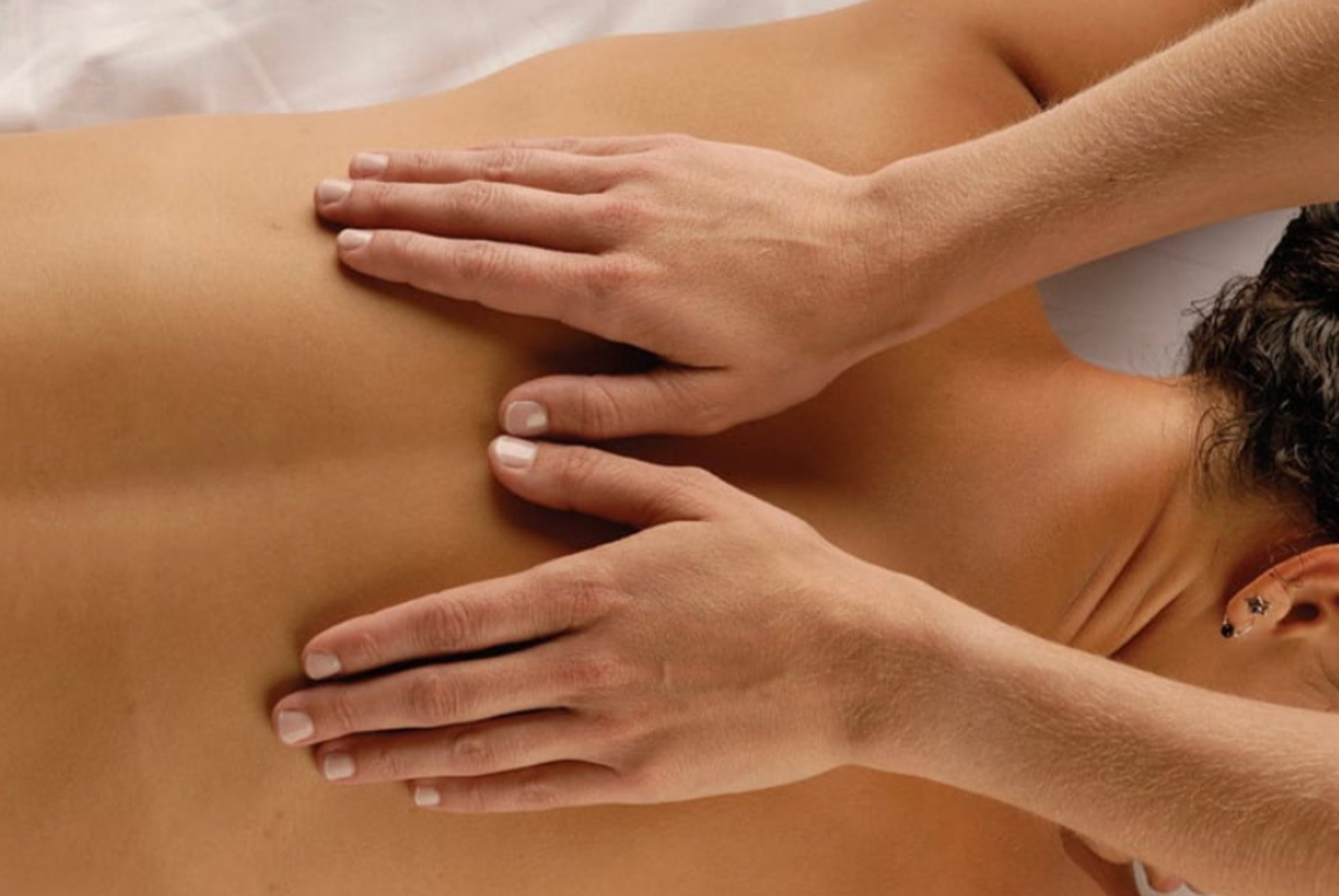 woman wearing yellow long-sleeved dress under white clouds and blue sky during daytime