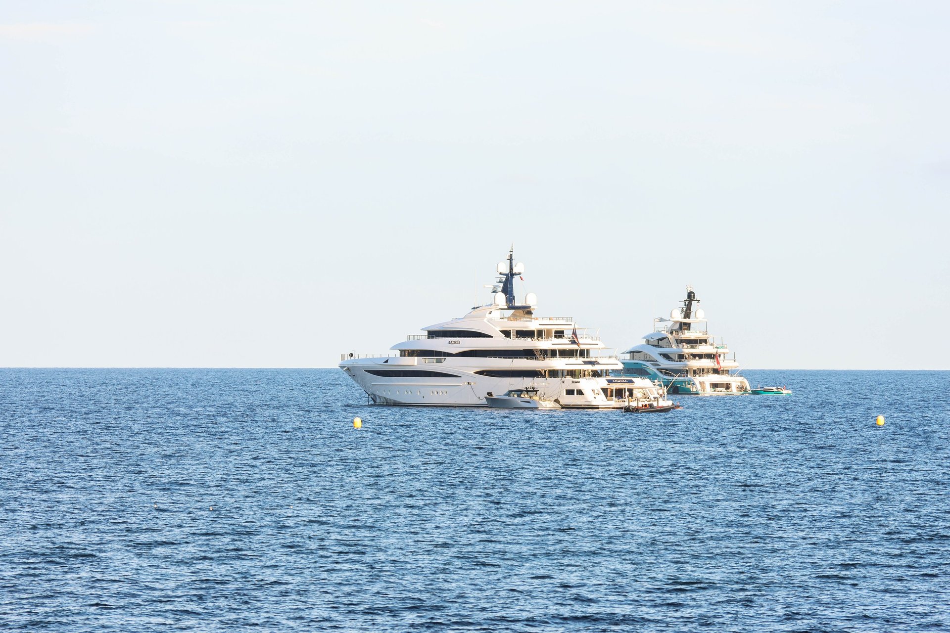 a rack of different colored spools of thread