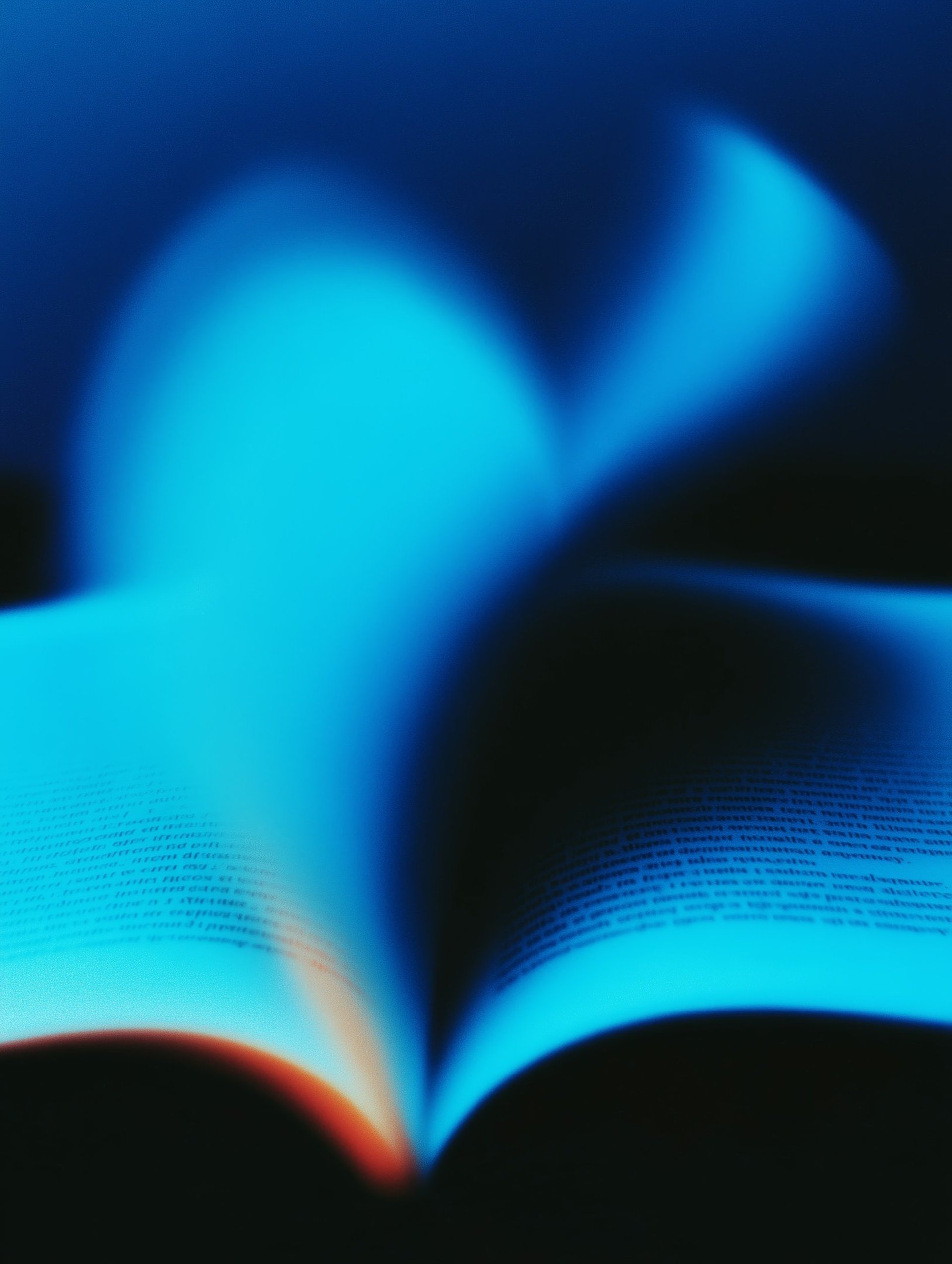 a rack of different colored spools of thread