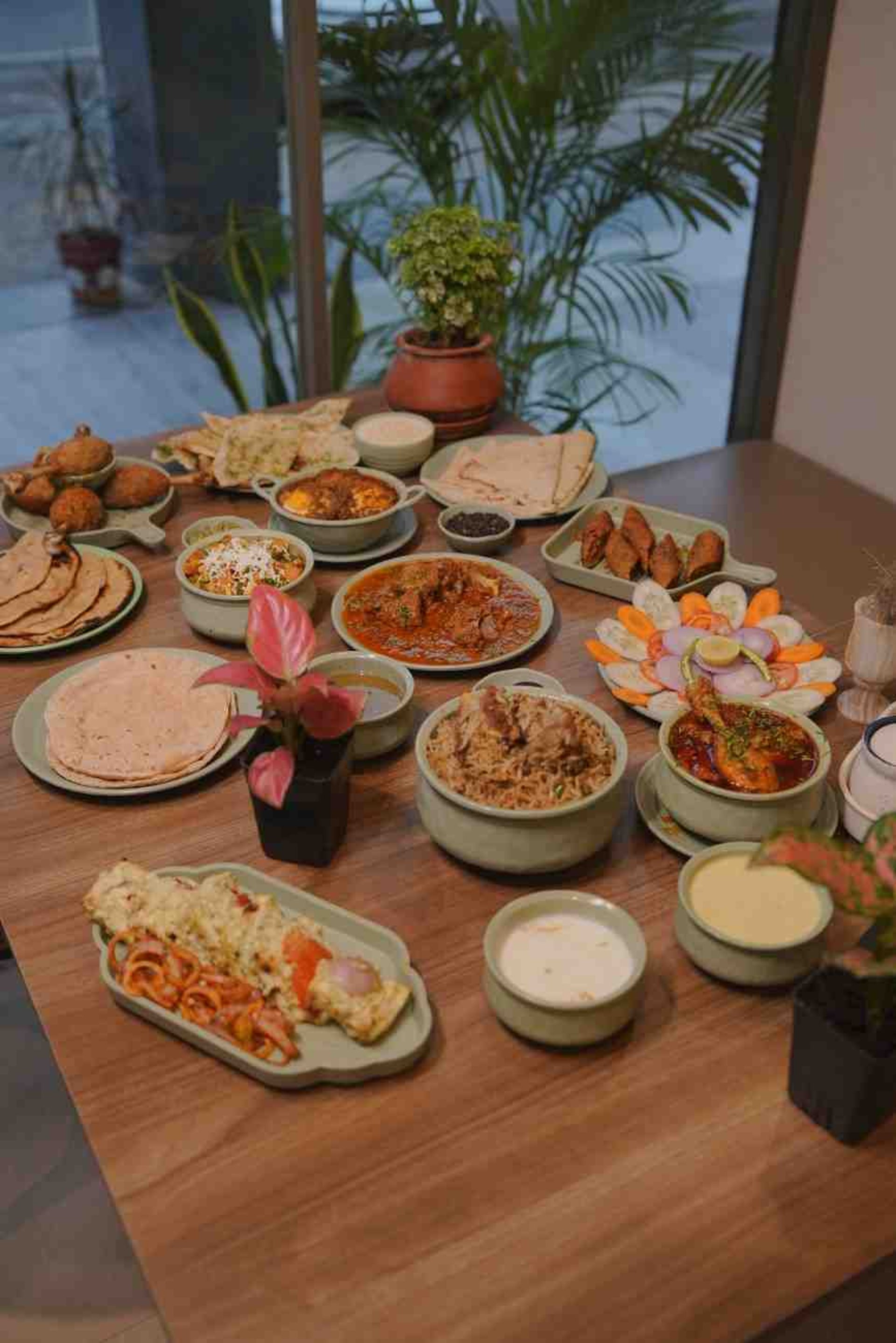 pasta dish on black plate