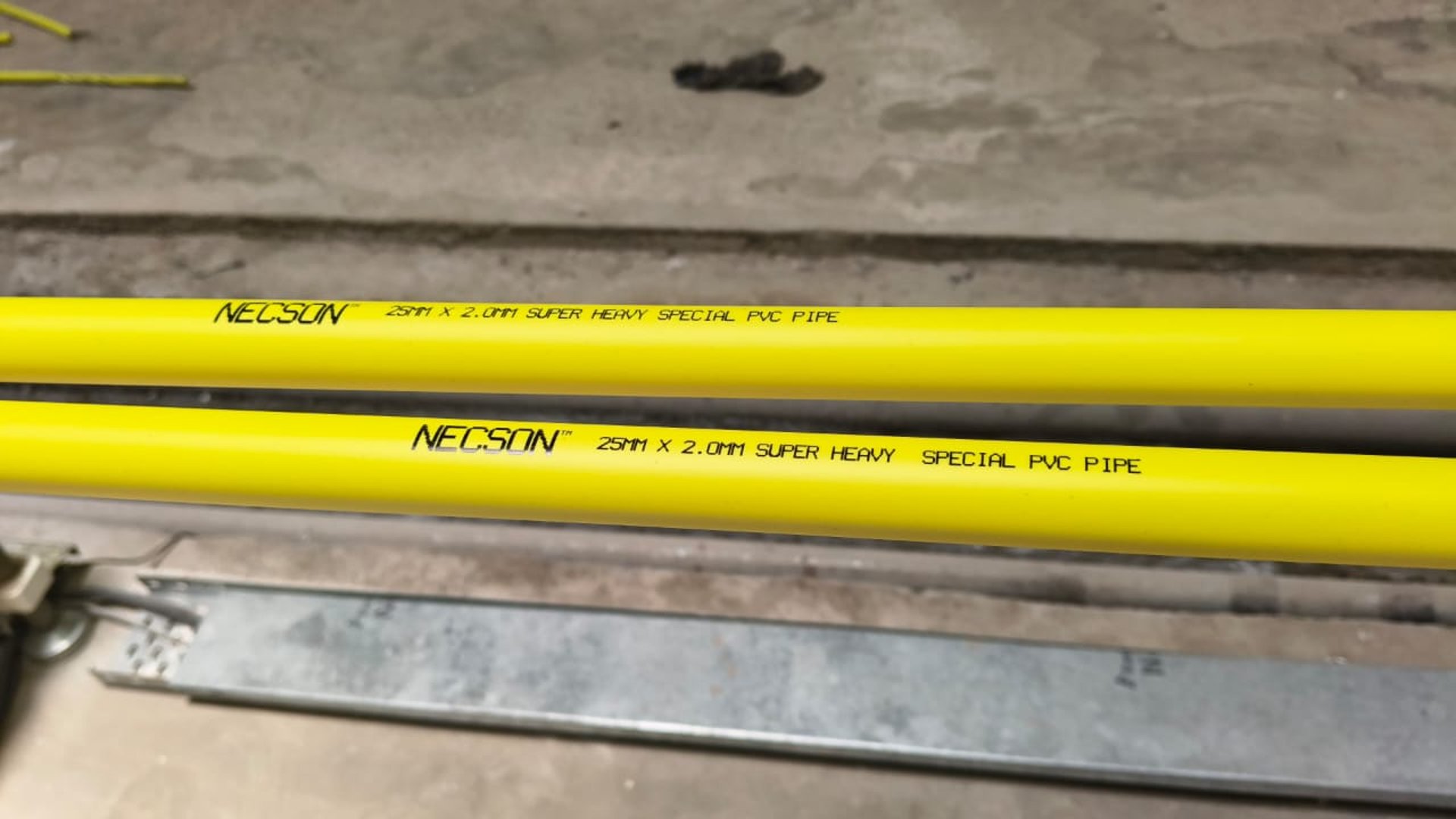 white textile with black rope