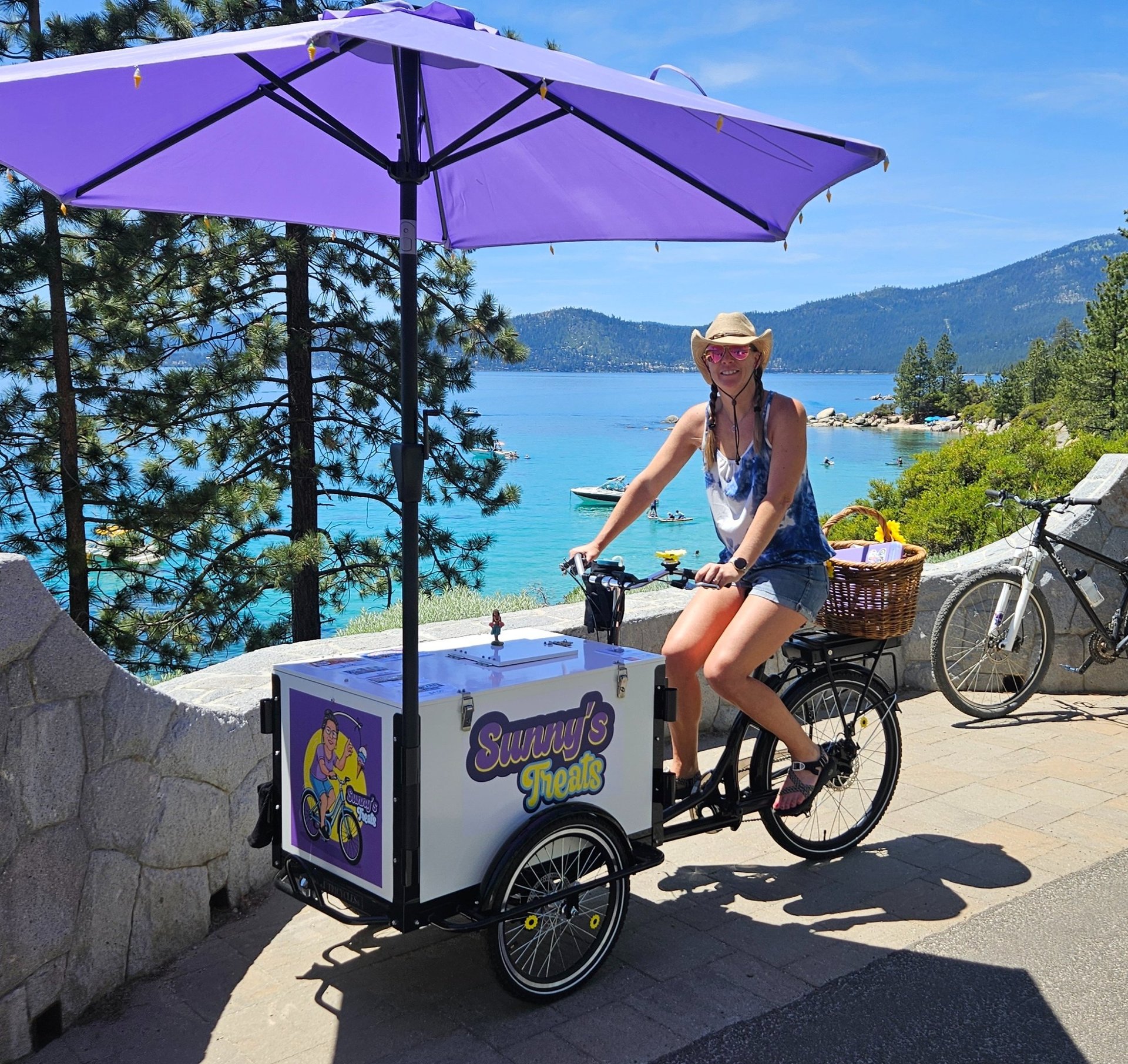 Bobbi on her E Tricycle on the East Shore Trail