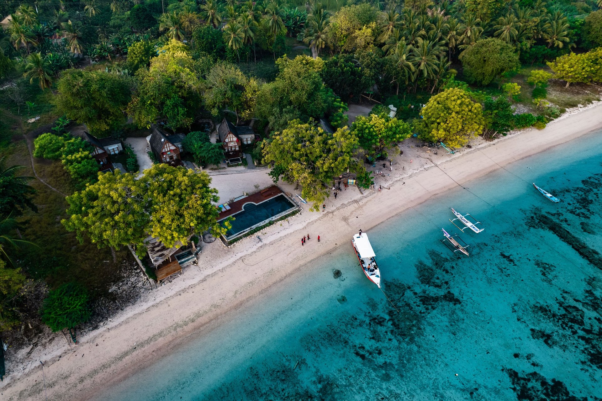 an abstract photo of a curved building with a blue sky in the background