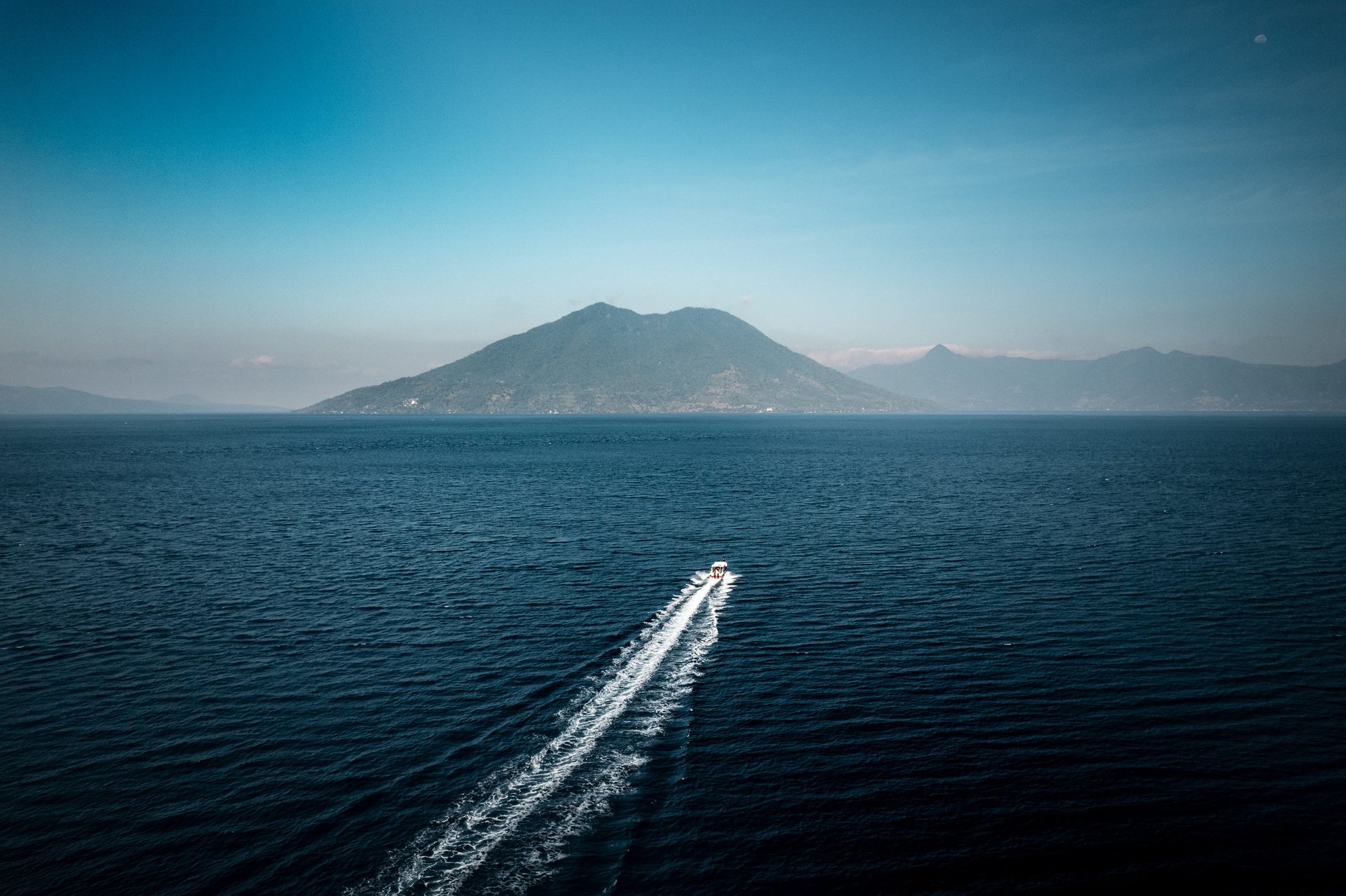 dive boat driving out in Alor for diving