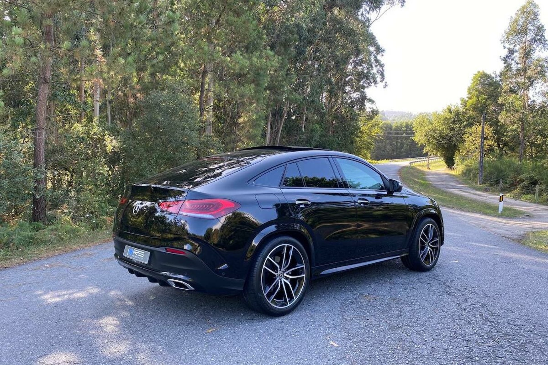woman wearing yellow long-sleeved dress under white clouds and blue sky during daytime