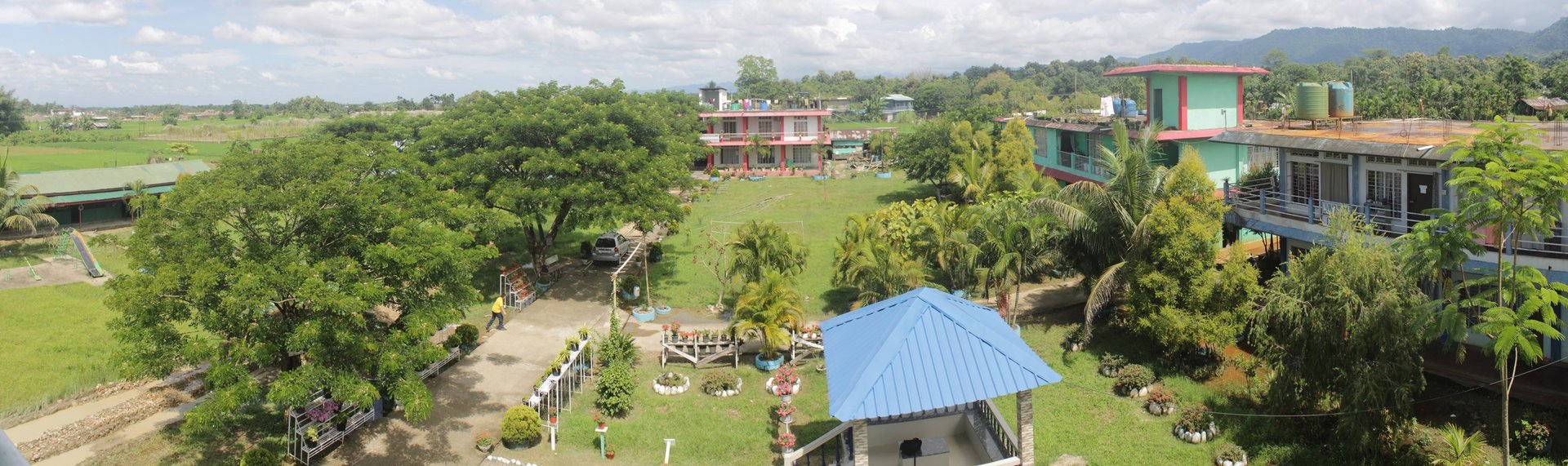 people sitting on grass field during daytime