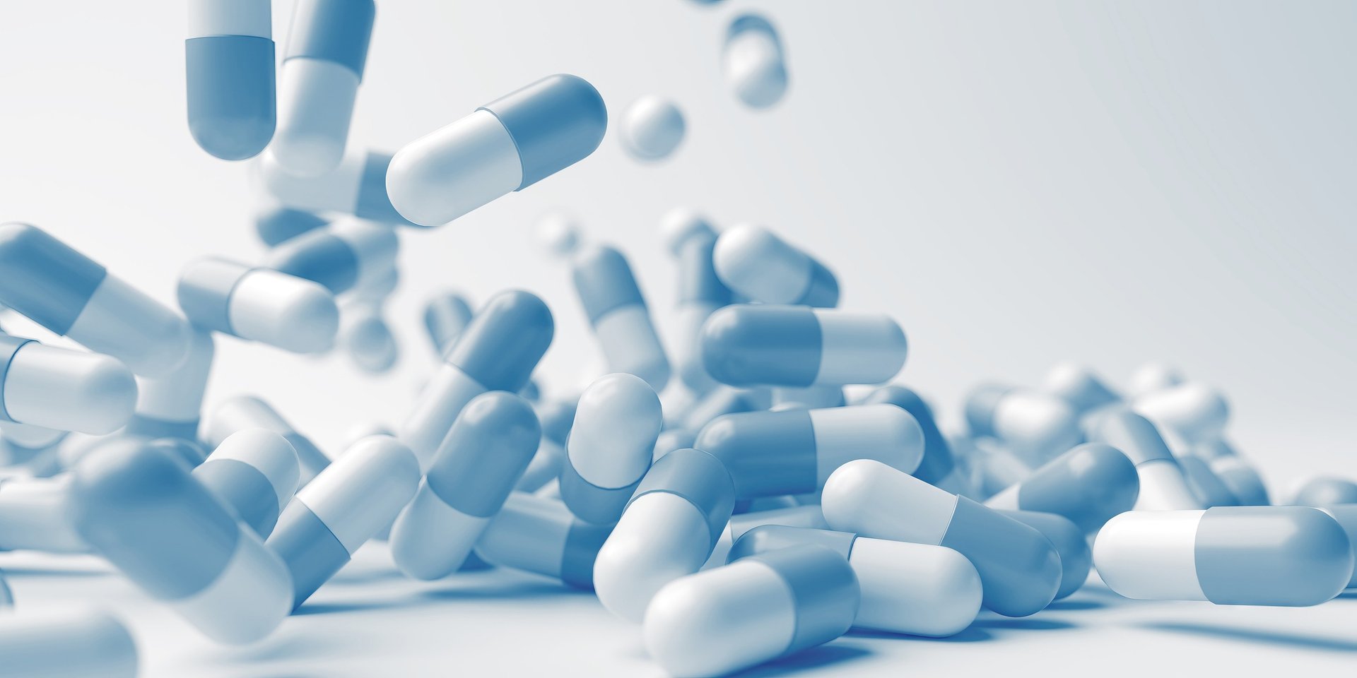 an abstract photo of a curved building with a blue sky in the background