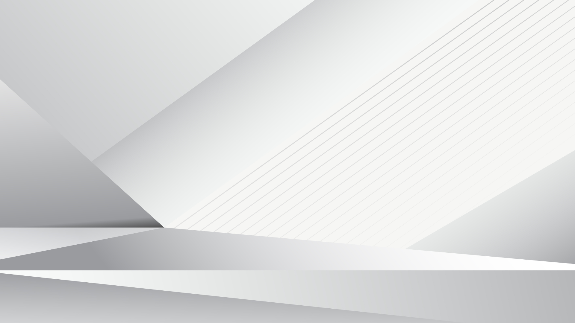 person wearing grey dress shirt beside table