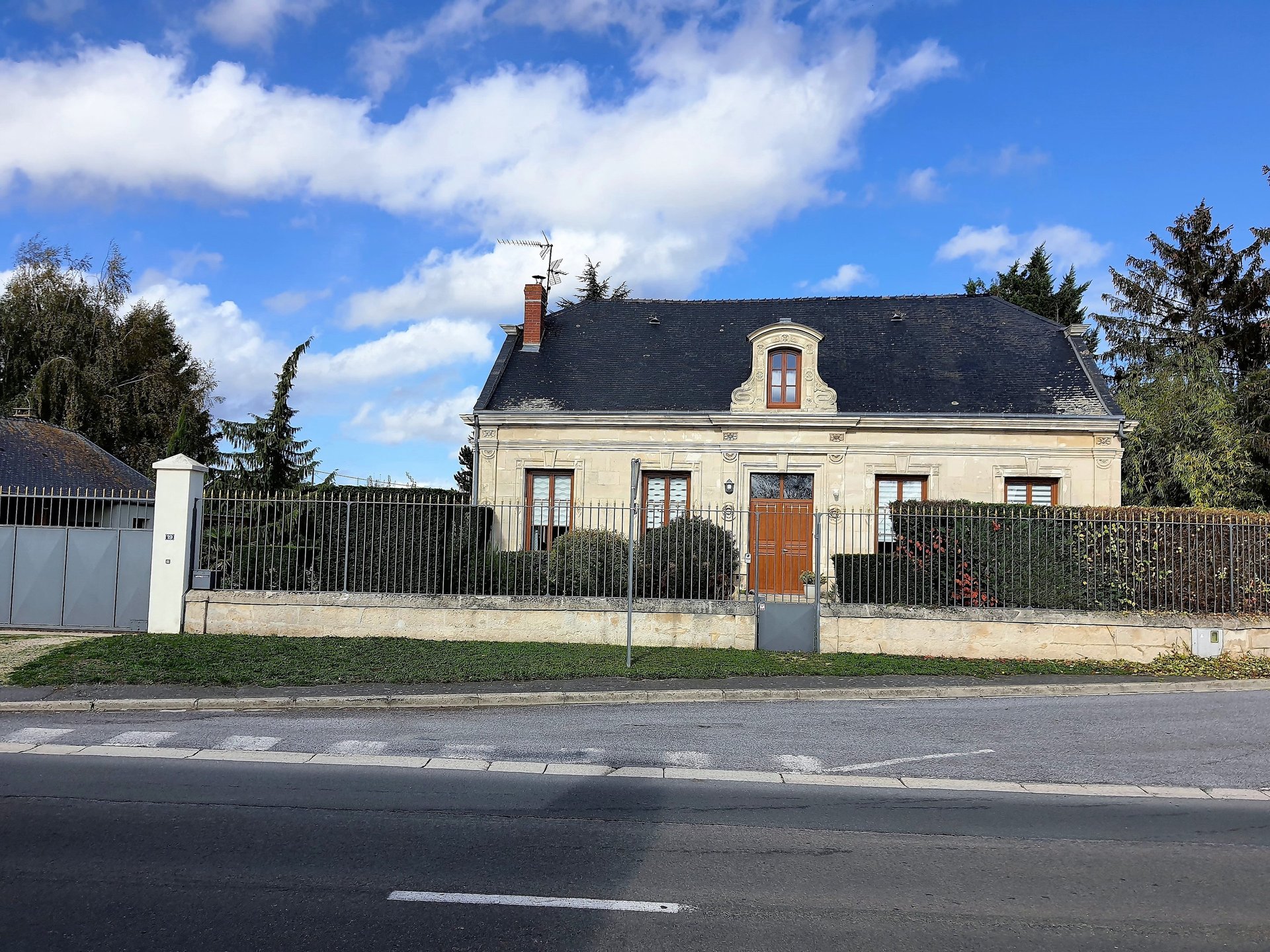 woman wearing yellow long-sleeved dress under white clouds and blue sky during daytime