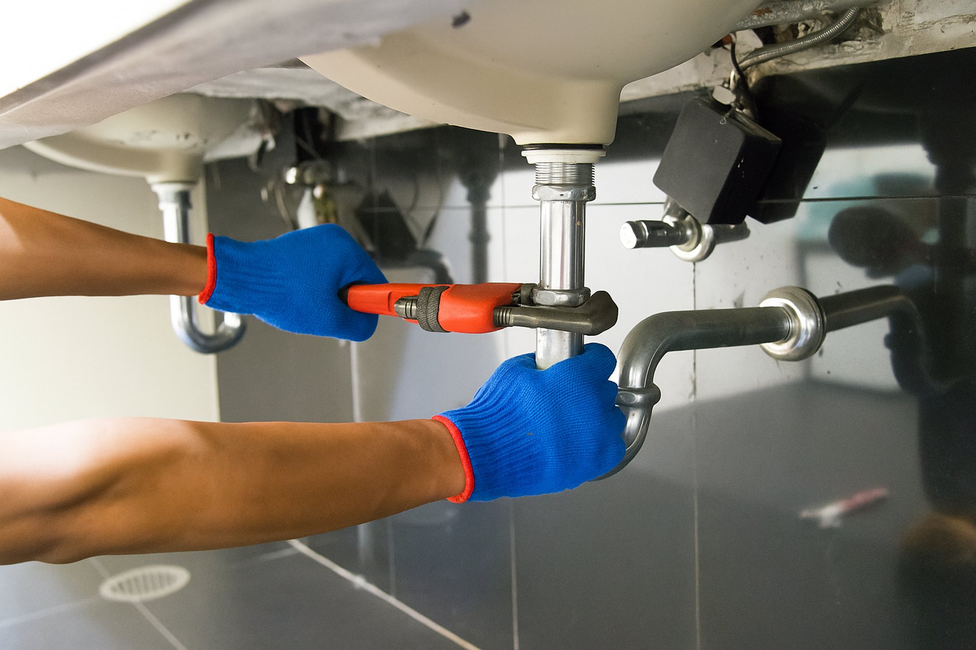 an abstract photo of a curved building with a blue sky in the background